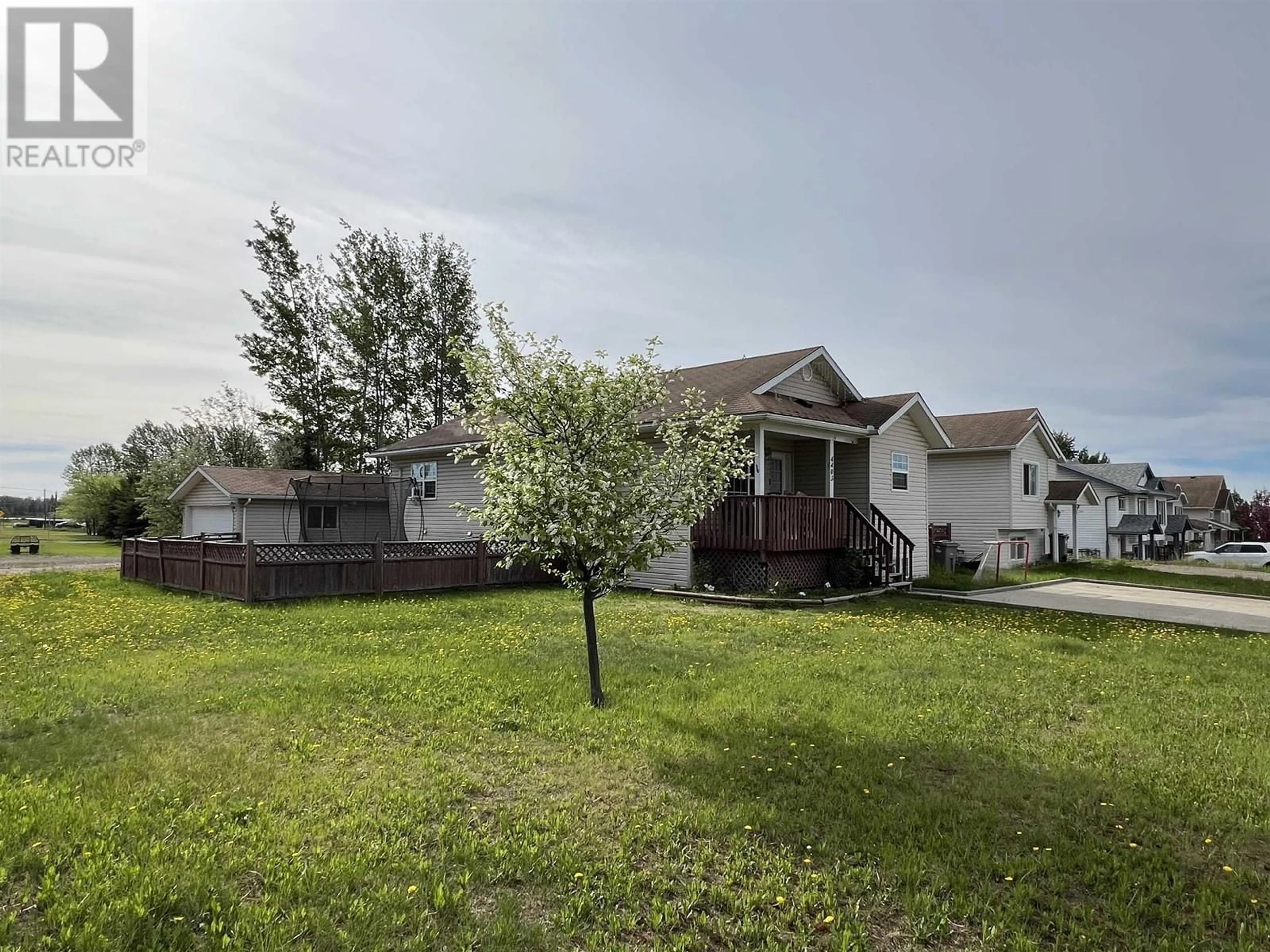 A pic from outside/outdoor area/front of a property/back of a property/a pic from drone, street for 4403 HERITAGE CRESCENT, Fort Nelson British Columbia V0C1R0