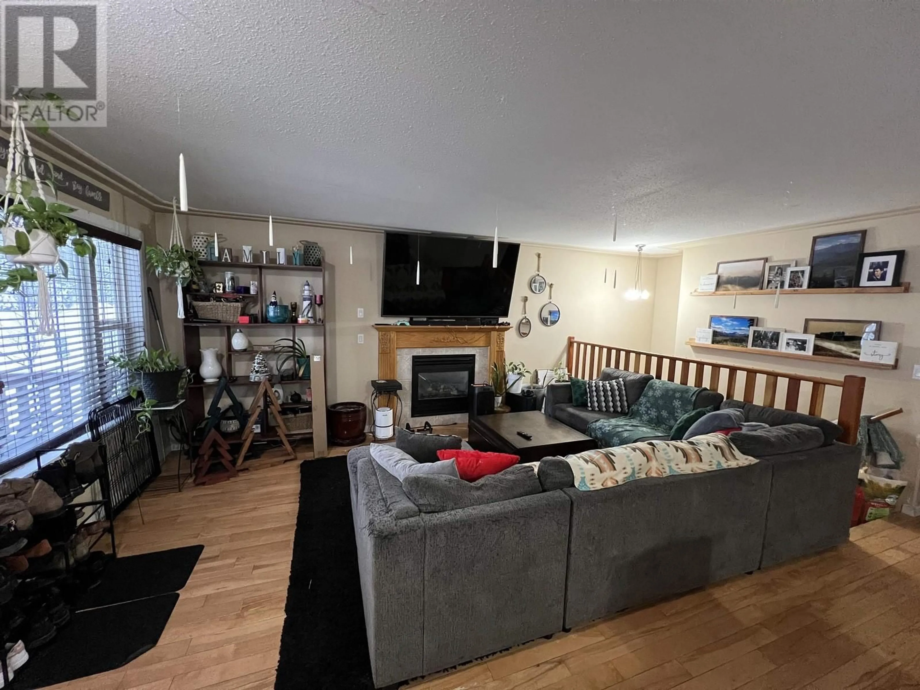 Living room with furniture, unknown for 4403 HERITAGE CRESCENT, Fort Nelson British Columbia V0C1R0