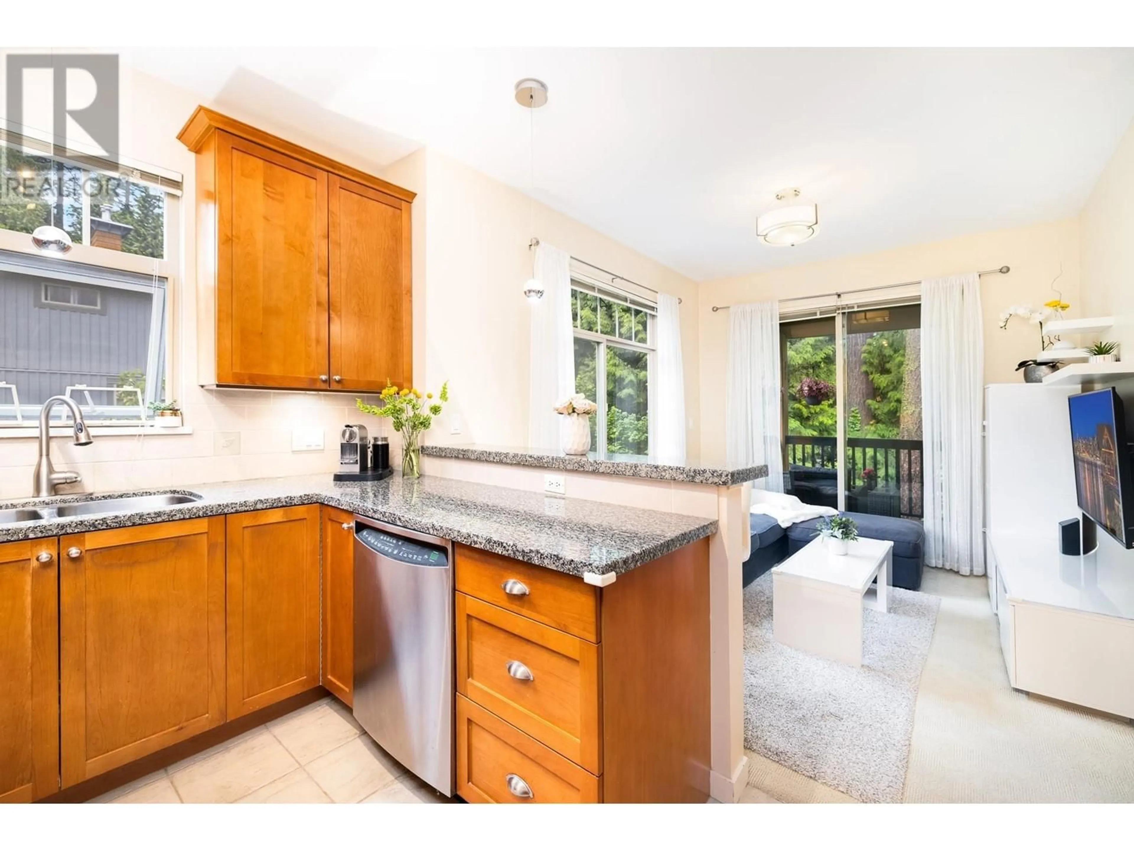 Open concept kitchen, ceramic/tile floor for 202 - 3125 CAPILANO CRESCENT, North Vancouver British Columbia V7R4X5