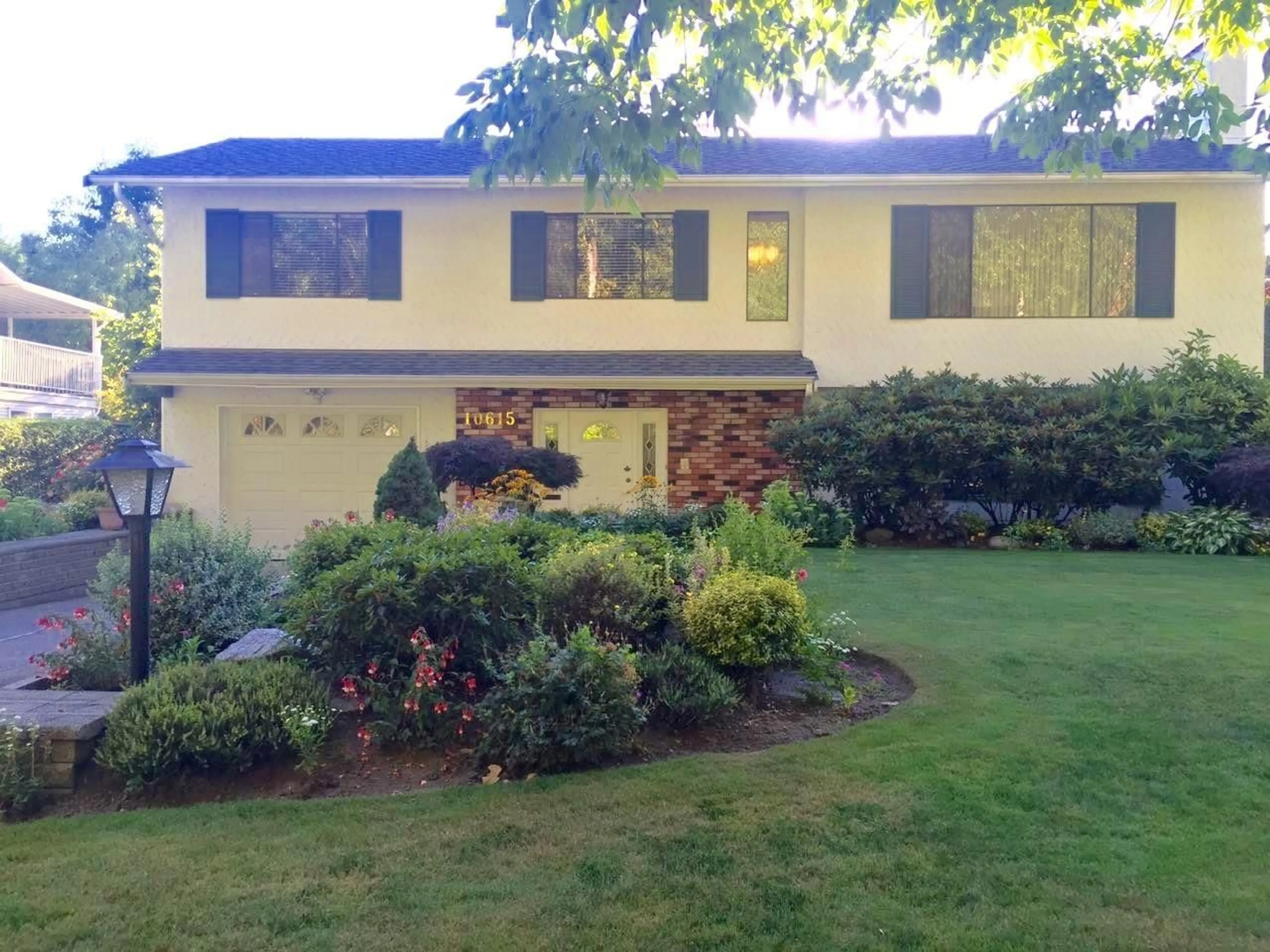 Home with vinyl exterior material, street for 10615 142A, Surrey British Columbia V3T5A1