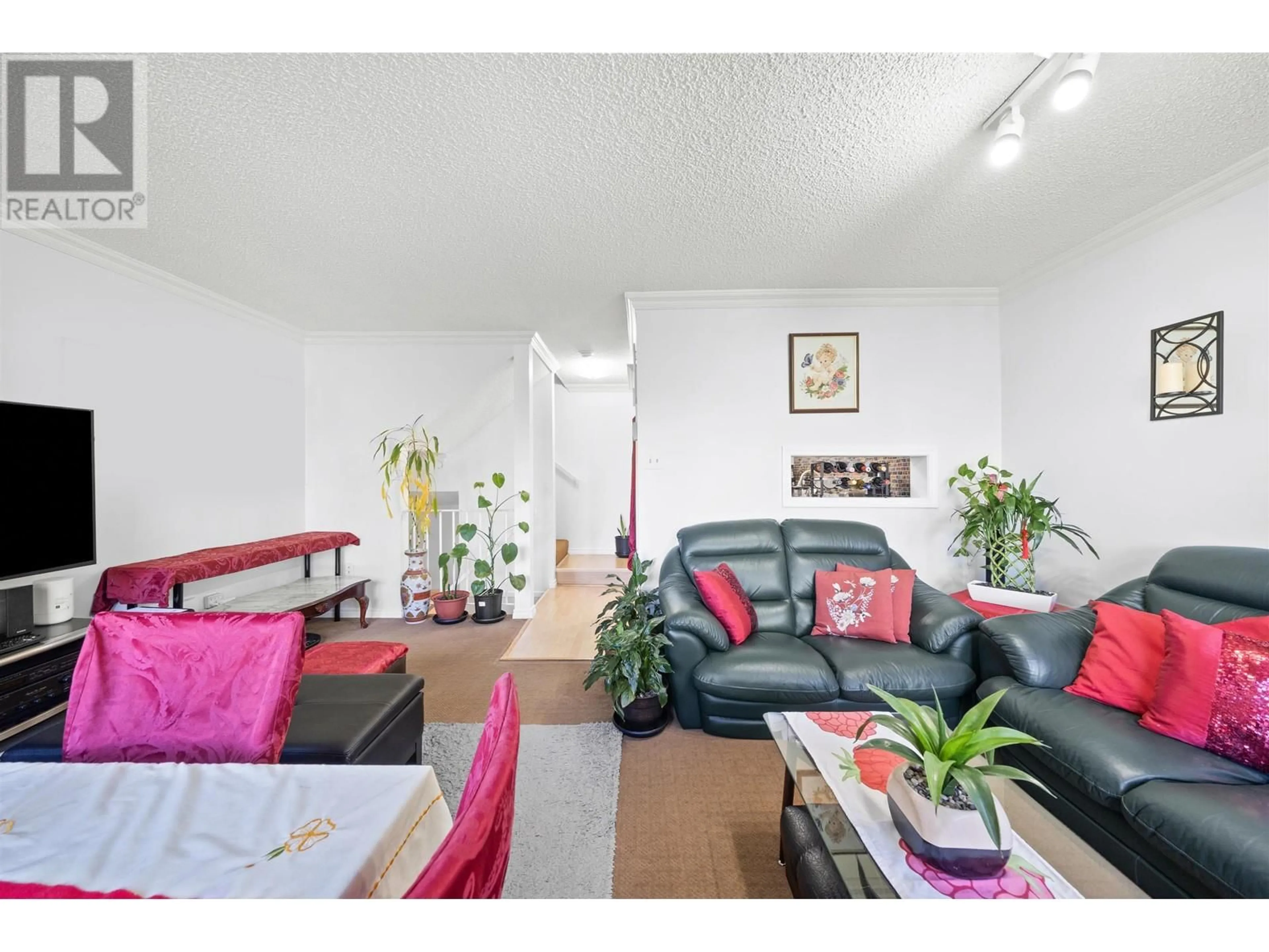 Living room with furniture, unknown for 203 - 8040 COLONIAL DRIVE, Richmond British Columbia V7C4V1