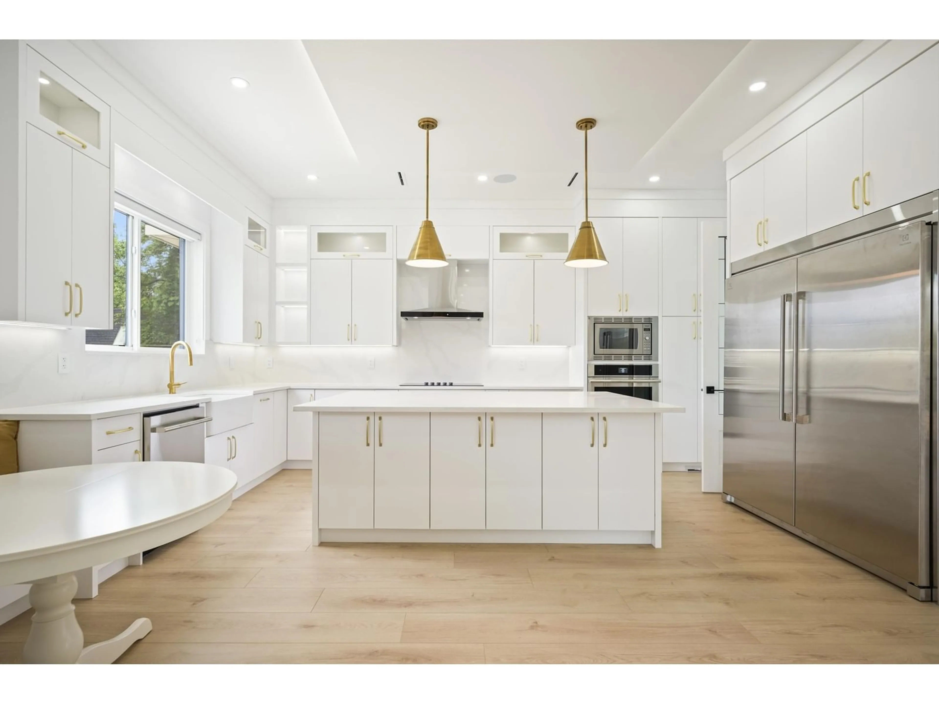 Open concept kitchen, wood/laminate floor for 10116 172A, Surrey British Columbia V4N4H6