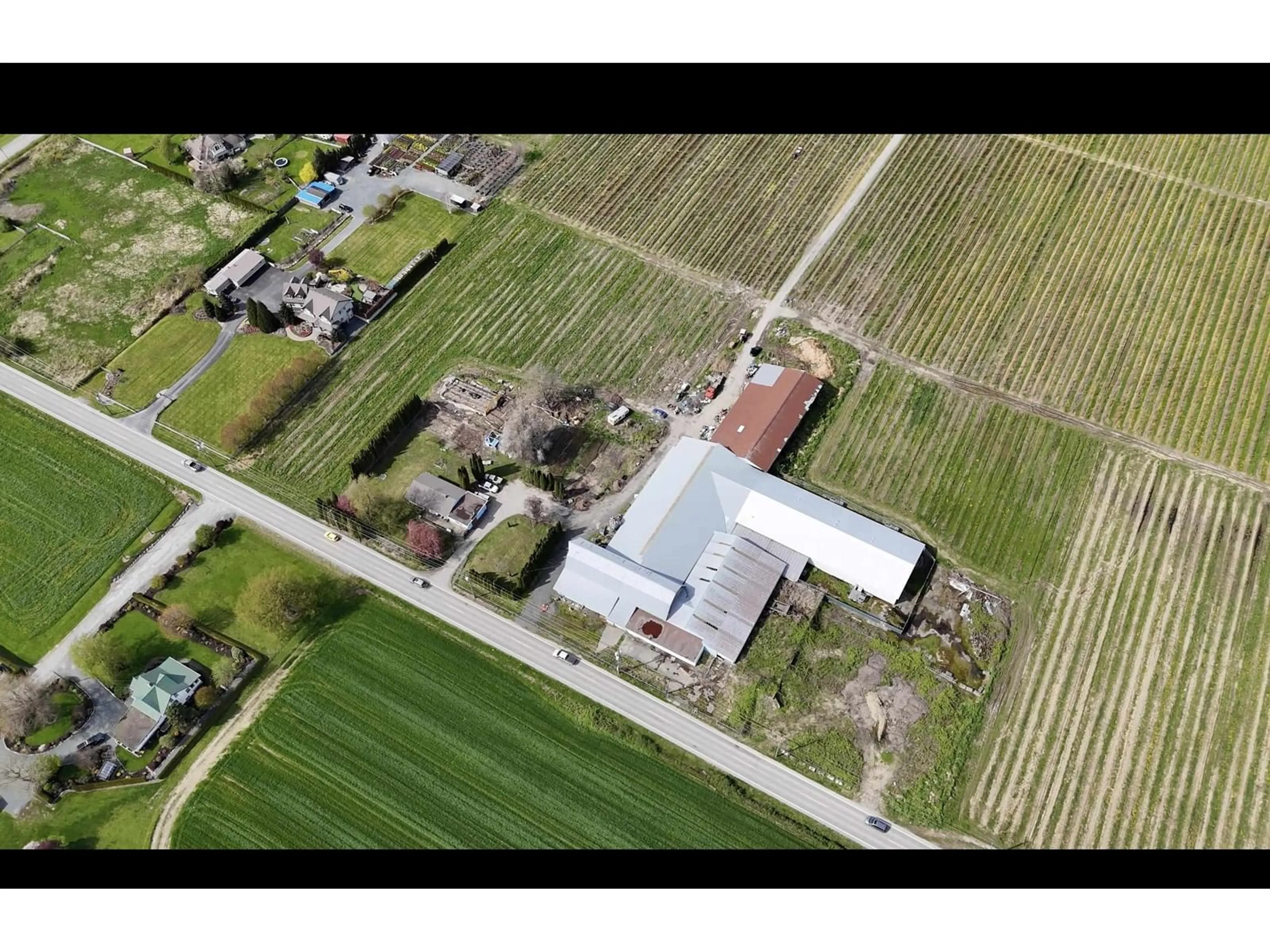 A pic from outside/outdoor area/front of a property/back of a property/a pic from drone, building for 42747 KEITH WILSON ROAD, Chilliwack British Columbia V2R4B3