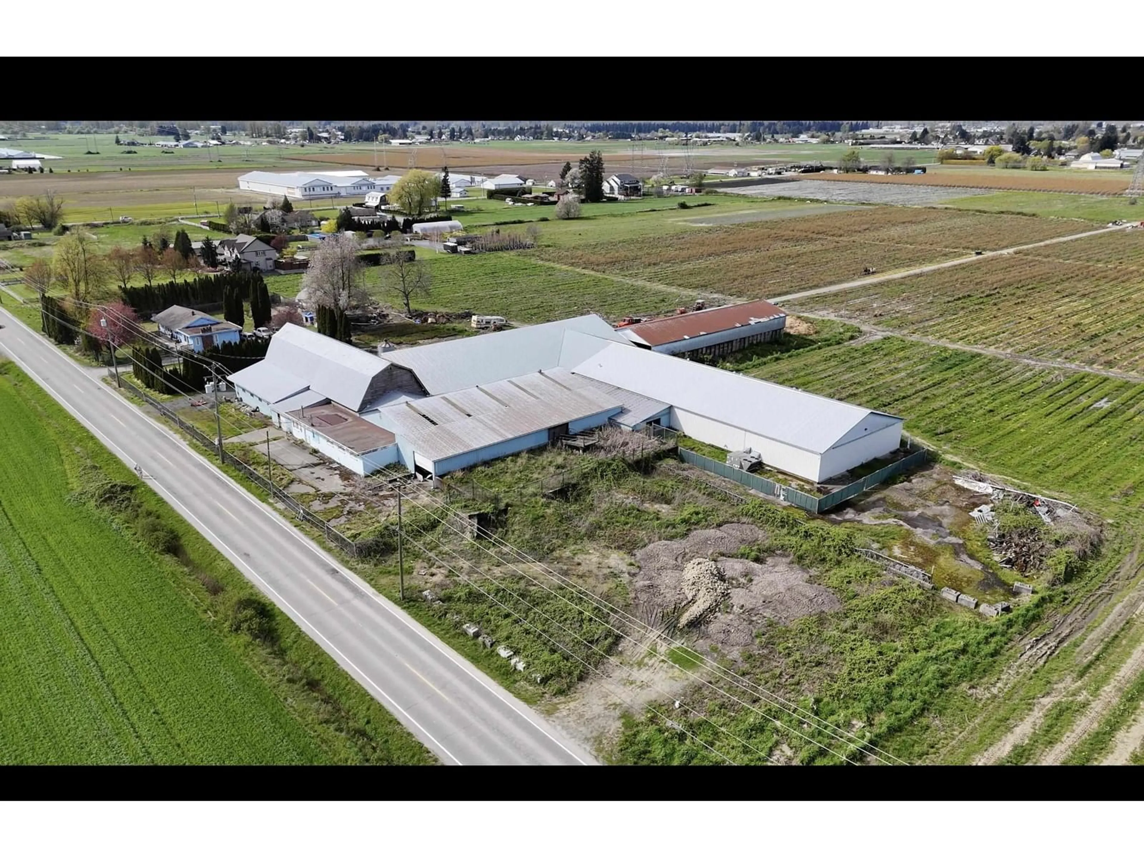 A pic from outside/outdoor area/front of a property/back of a property/a pic from drone, building for 42747 KEITH WILSON ROAD, Chilliwack British Columbia V2R4B3