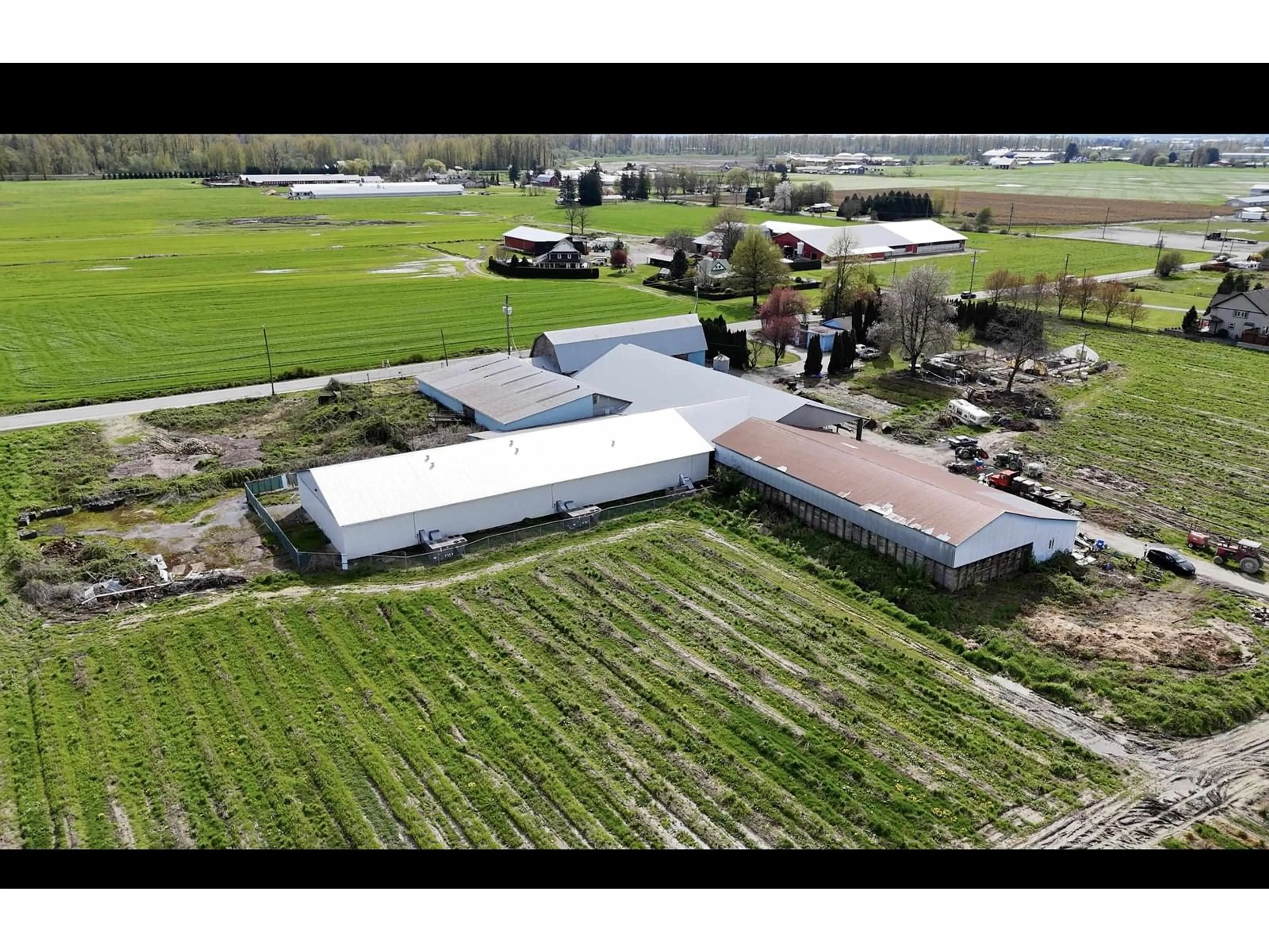 A pic from outside/outdoor area/front of a property/back of a property/a pic from drone, building for 42747 KEITH WILSON ROAD, Chilliwack British Columbia V2R4B3
