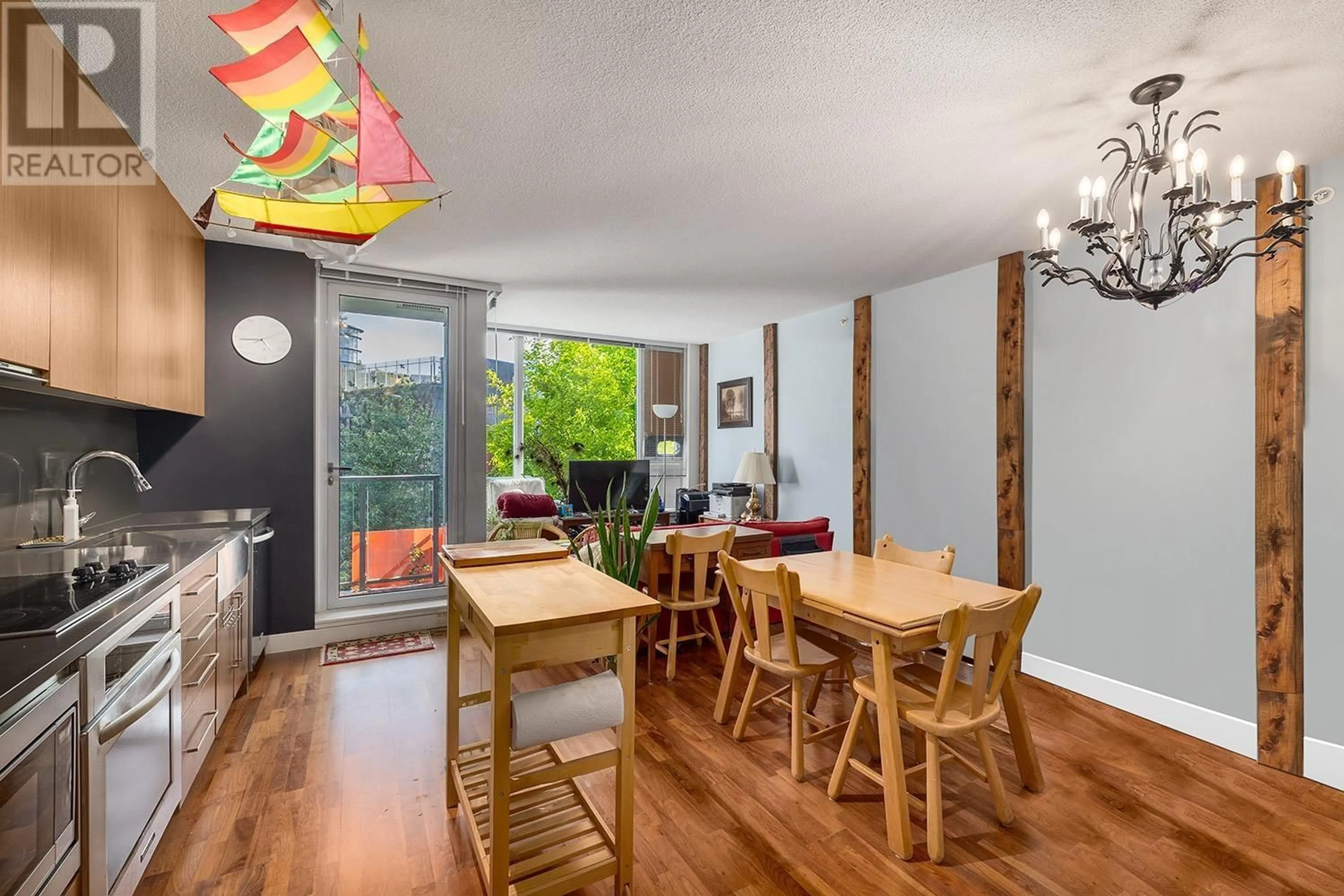 Dining room, wood/laminate floor for 504 - 251 7TH AVENUE, Vancouver British Columbia V5T0B9