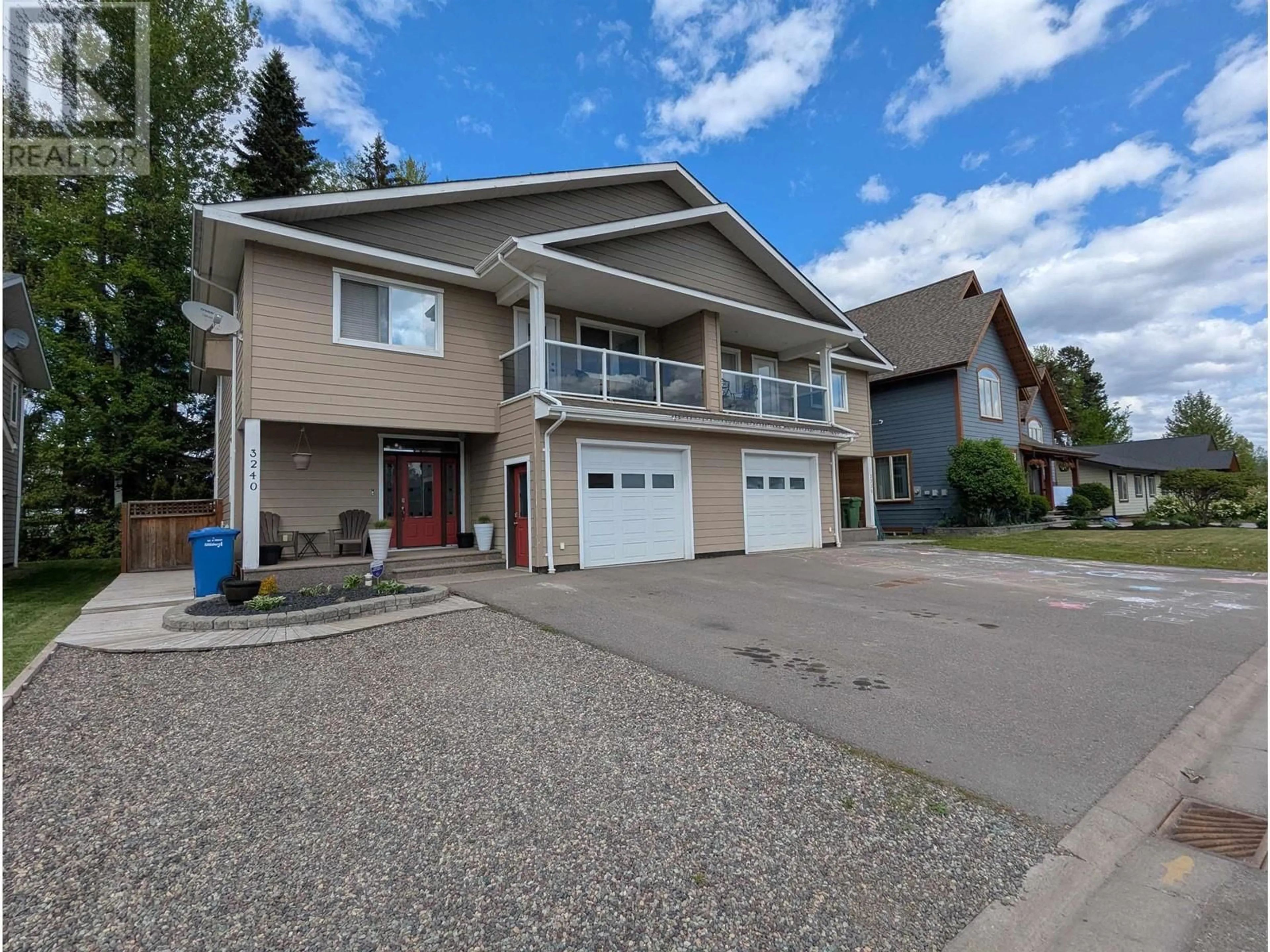 Home with vinyl exterior material, street for 3240 3RD AVENUE, Smithers British Columbia V0J2N0