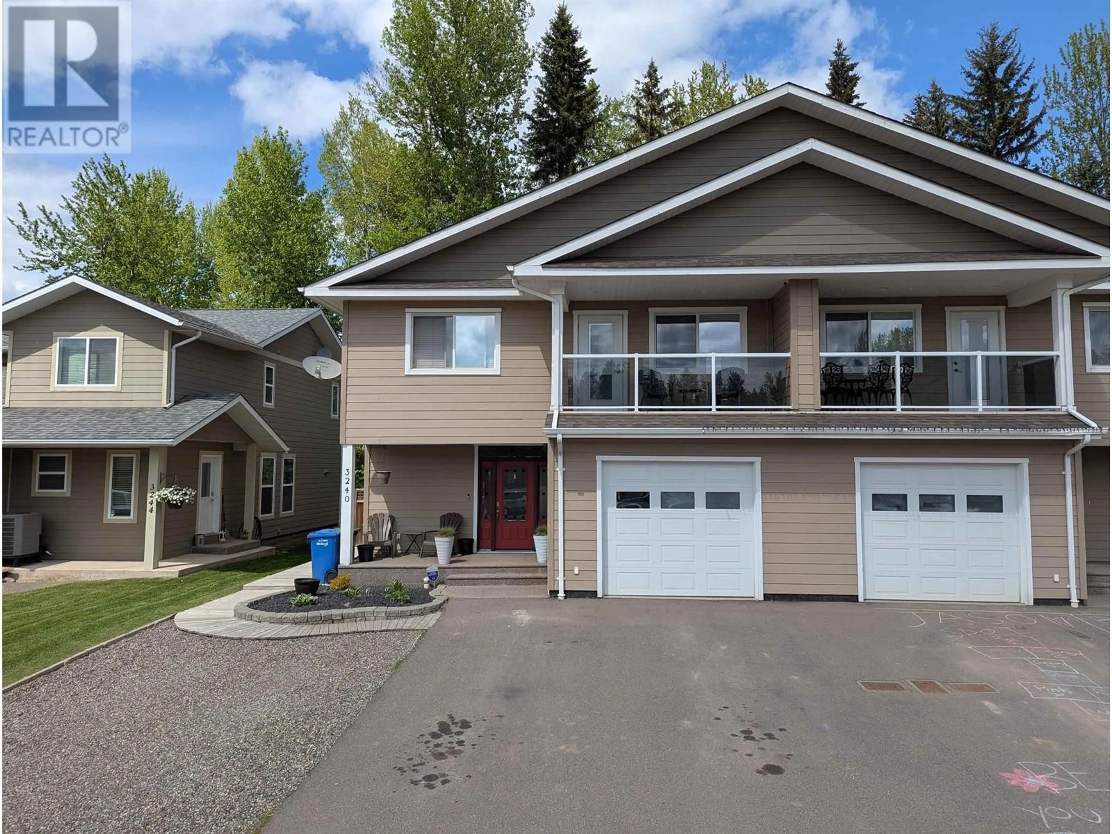 Home with vinyl exterior material, street for 3240 3RD AVENUE, Smithers British Columbia V0J2N0