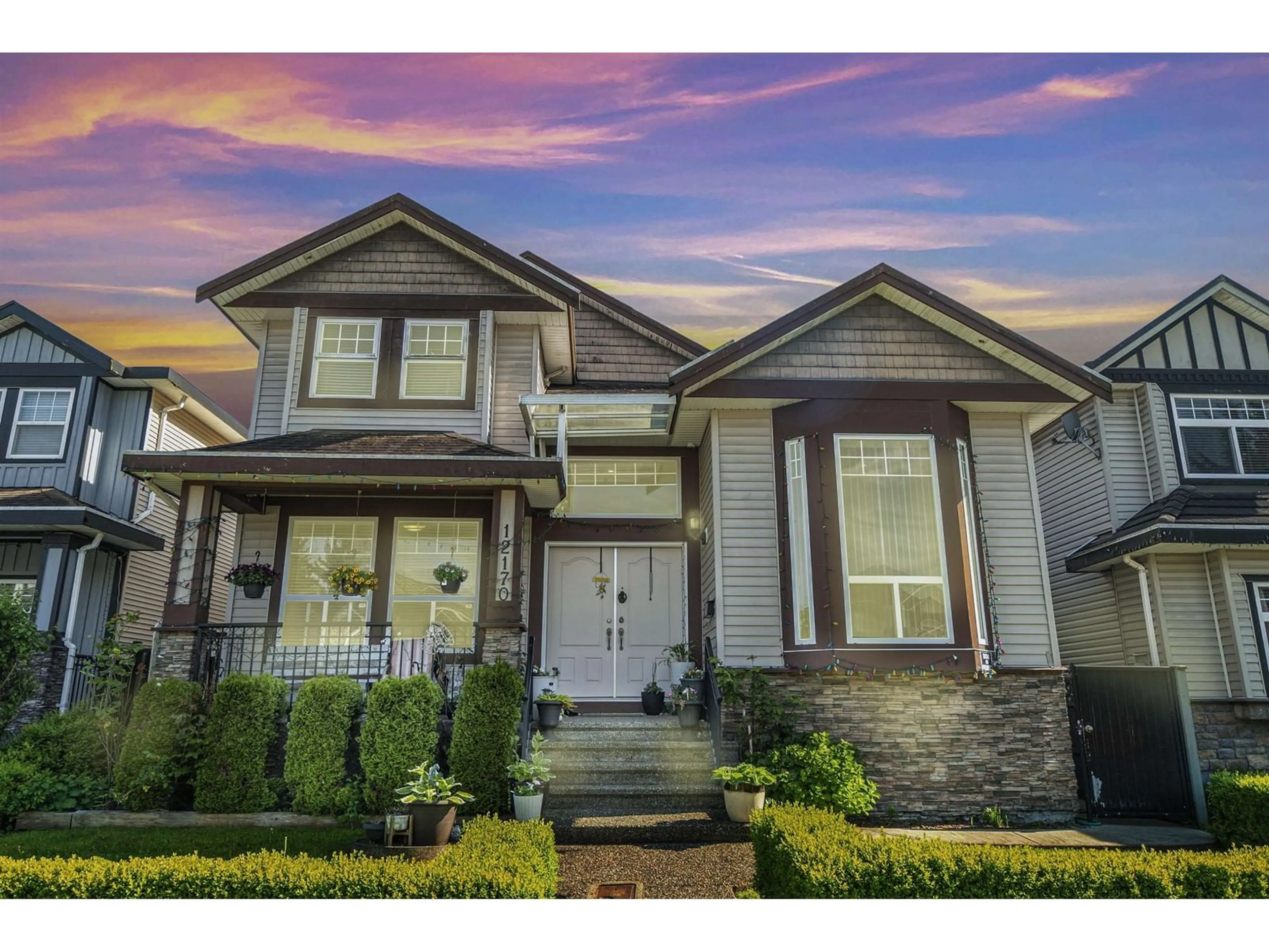 Home with vinyl exterior material, street for 12170 96A, Surrey British Columbia V3V7C3