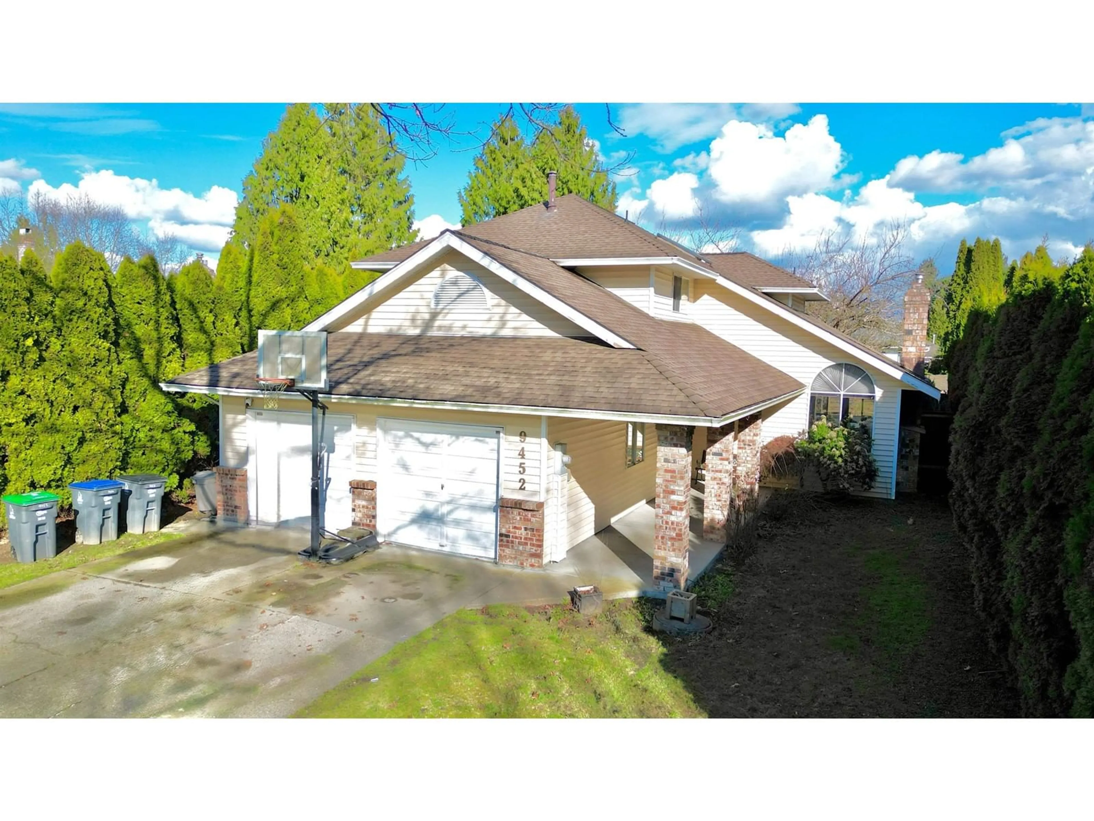 A pic from outside/outdoor area/front of a property/back of a property/a pic from drone, street for 9452 157A, Surrey British Columbia V4N3B6