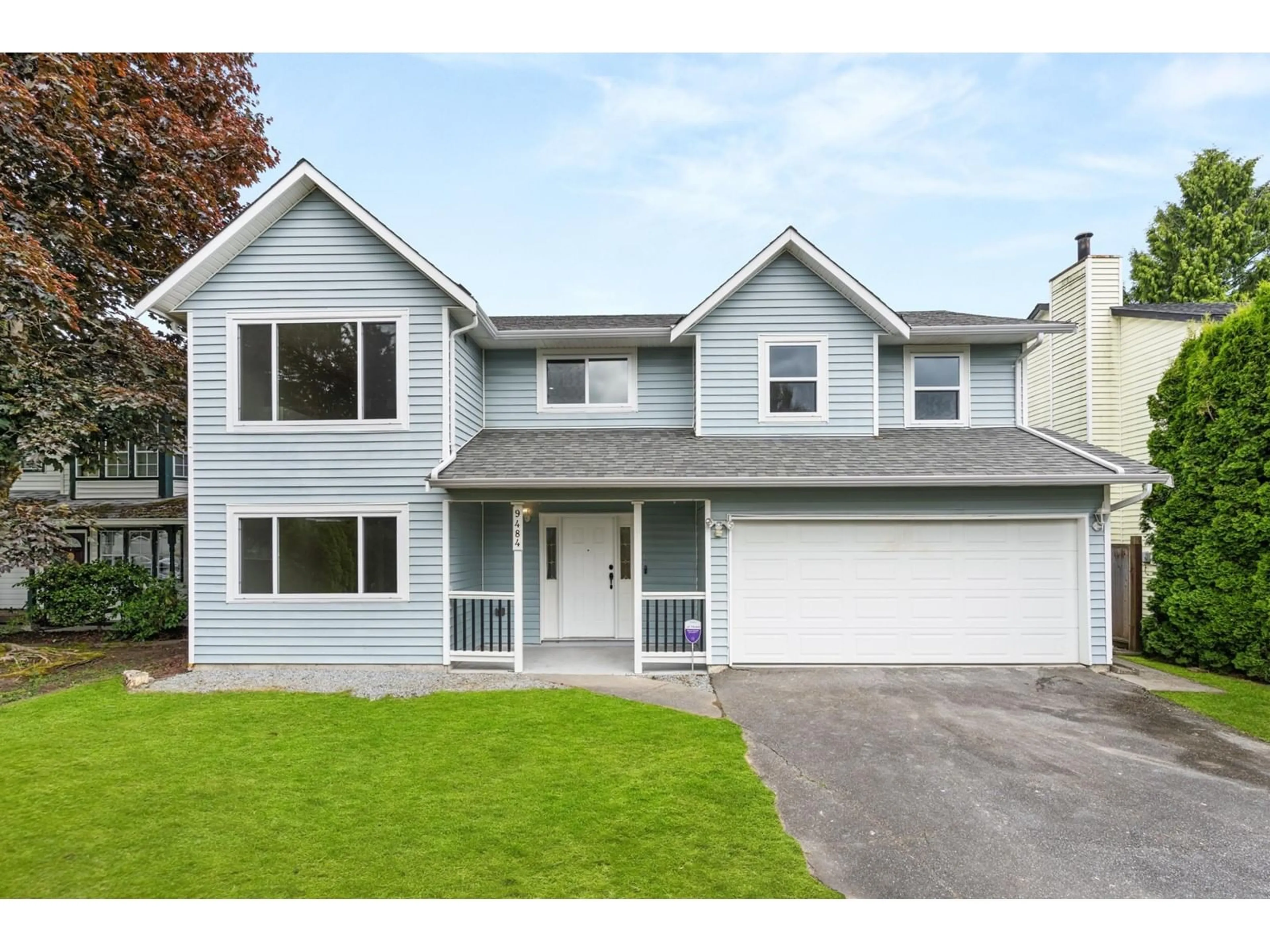 Home with vinyl exterior material, street for 9484 209B, Langley British Columbia V1M2A9