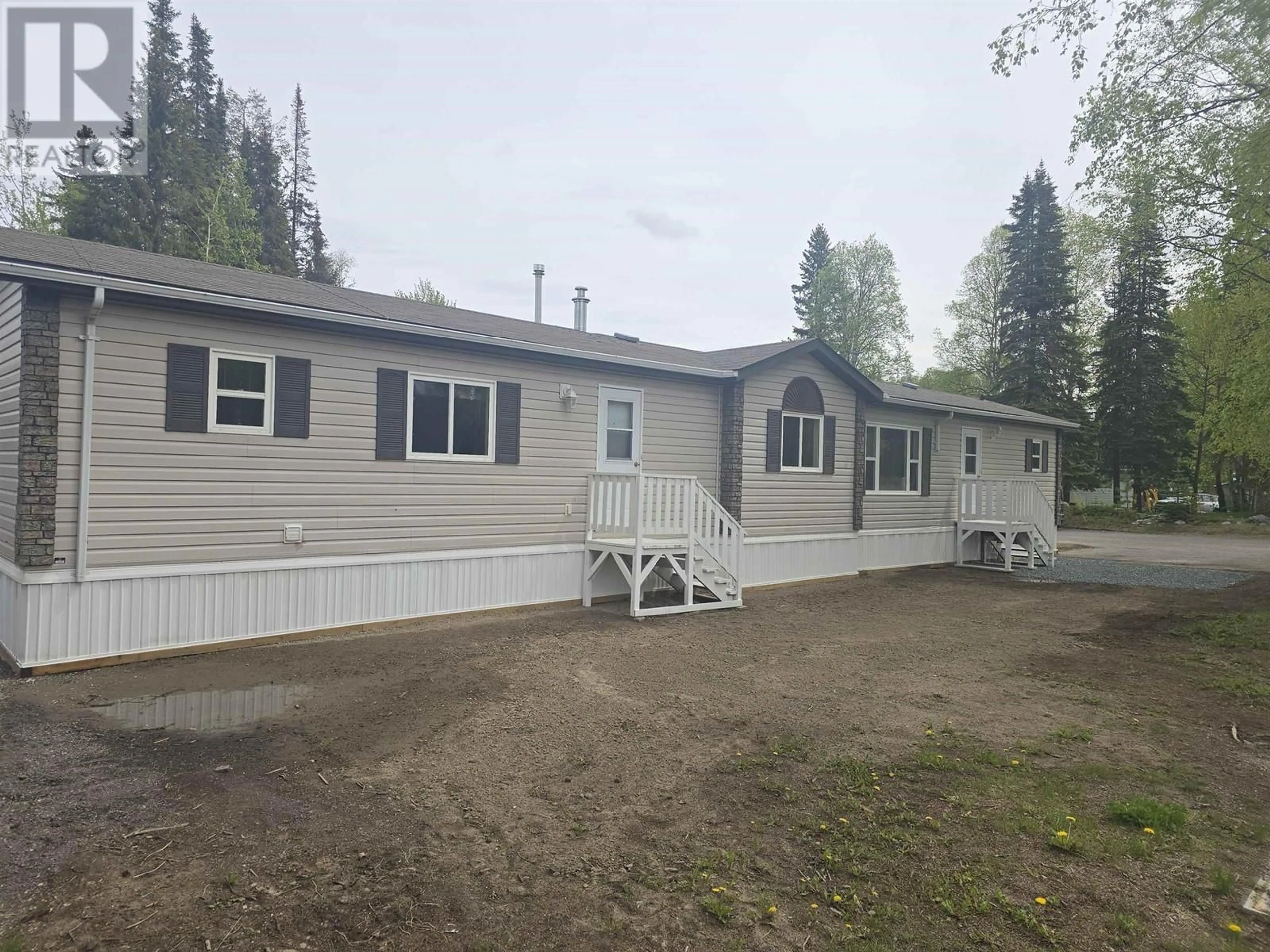 A pic from outside/outdoor area/front of a property/back of a property/a pic from drone, unknown for 1 - 7170 HART HIGHWAY, Prince George British Columbia V2K3A8
