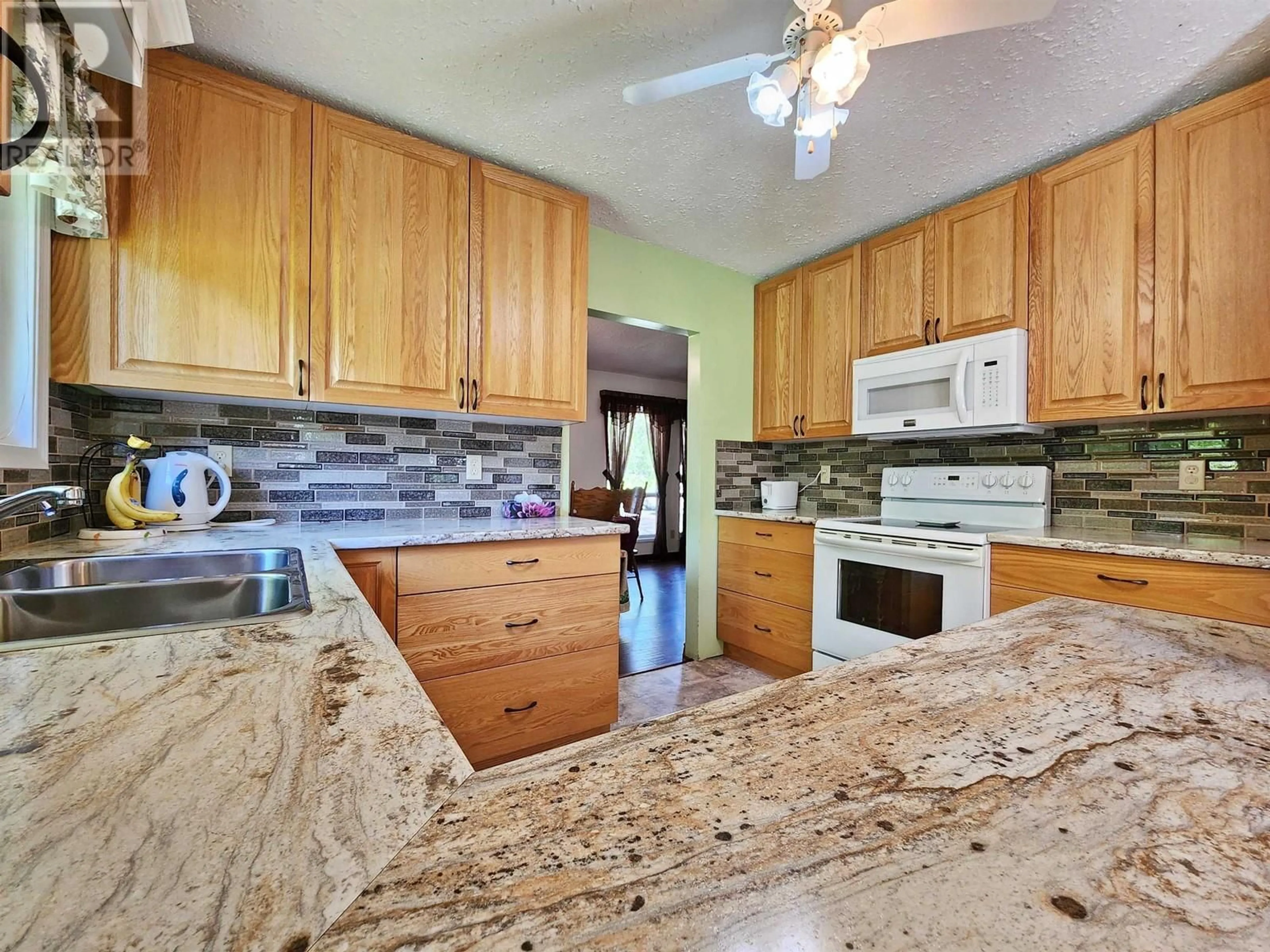 Open concept kitchen, ceramic/tile floor for 1116 RED BLUFF ROAD, Quesnel British Columbia V2J4S8