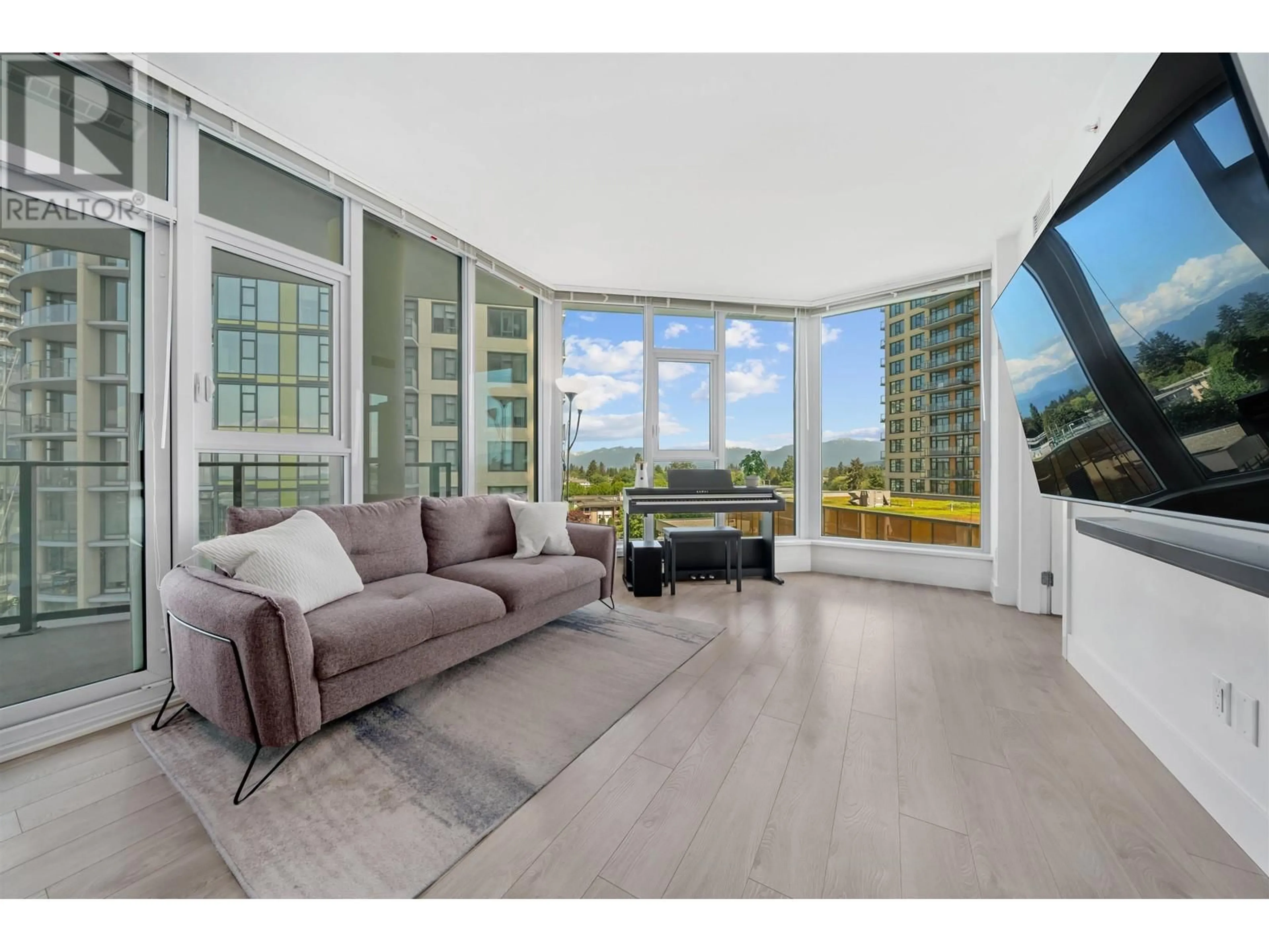 Living room with furniture, floor is not visible for 802 - 7388 KINGSWAY, Burnaby British Columbia V3N0G9
