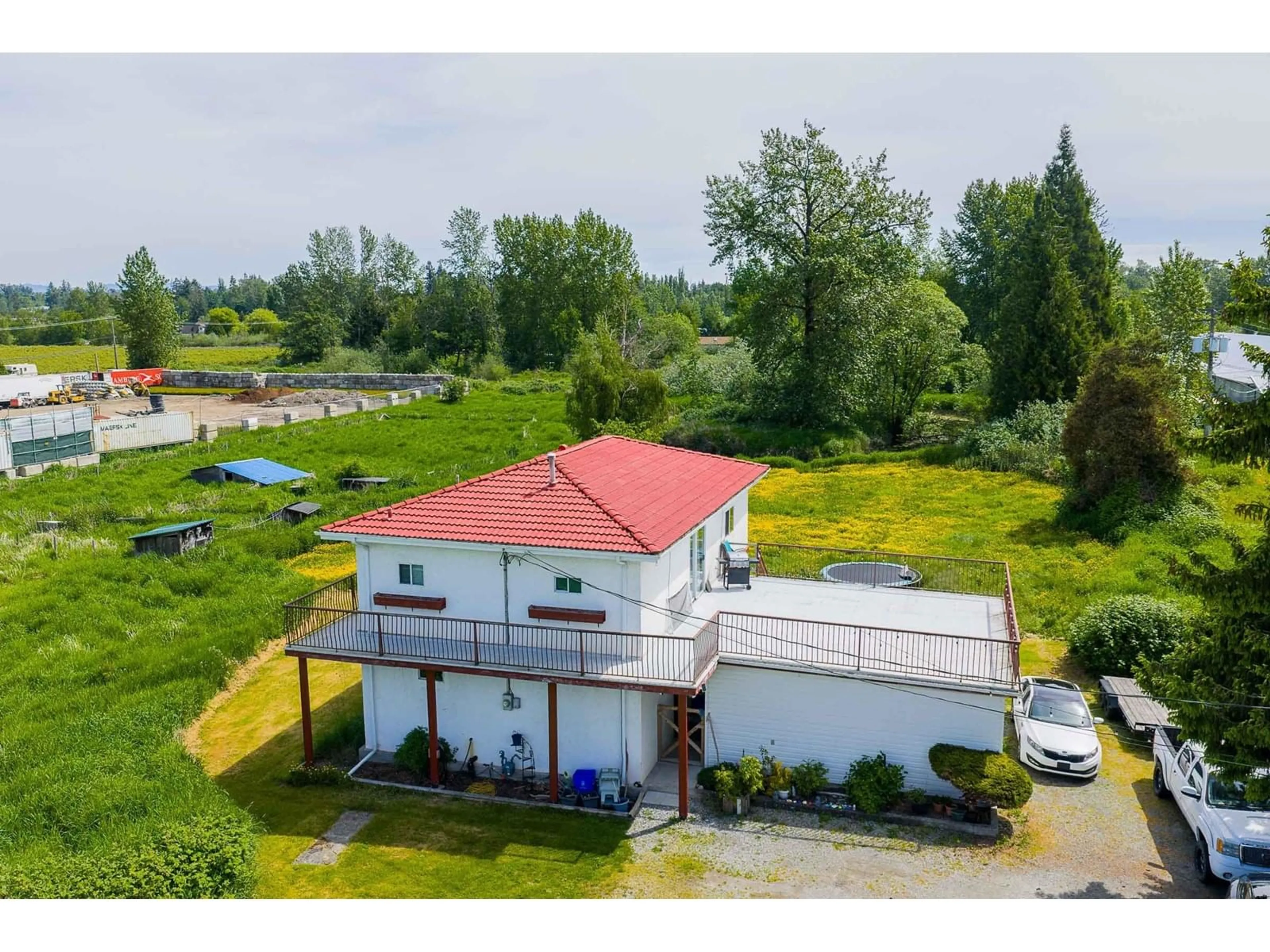 A pic from outside/outdoor area/front of a property/back of a property/a pic from drone, building for 1550 227, Langley British Columbia V2Z1K6