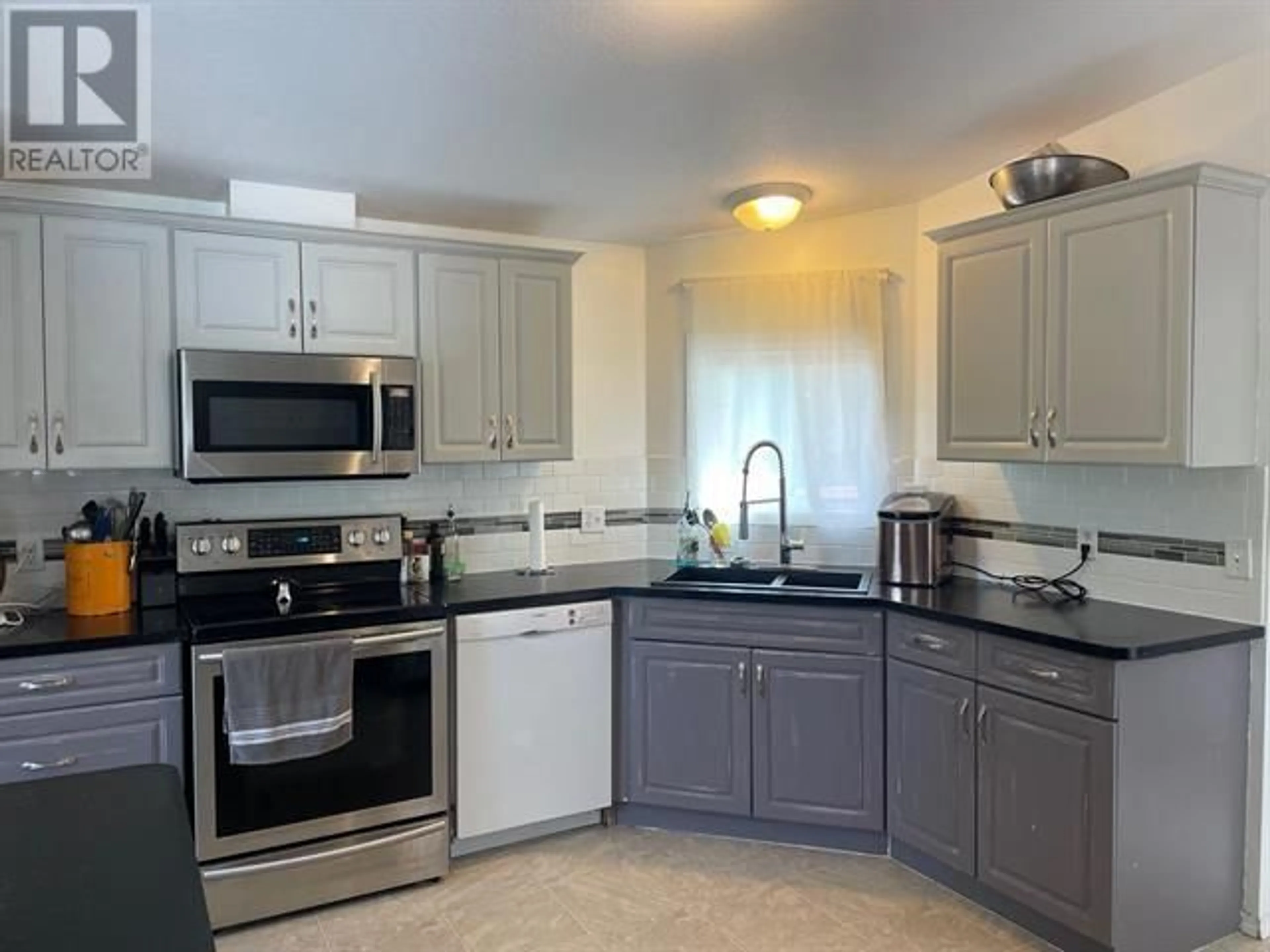 Standard kitchen, ceramic/tile floor for 166 MCCONACHIE CREEK ROAD, Fort Nelson British Columbia V0C1R0