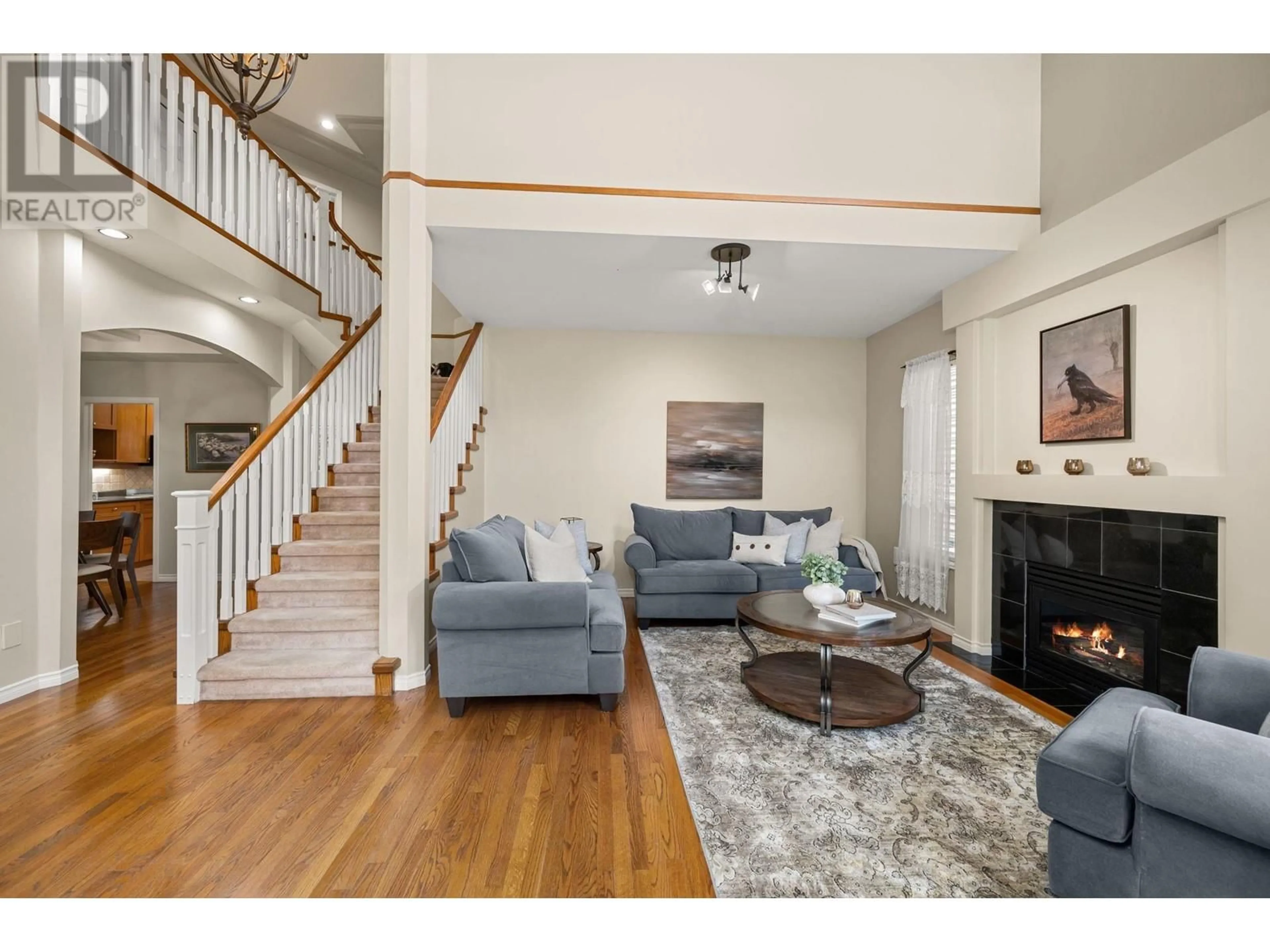 Living room with furniture, wood/laminate floor for 2927 PARANA PLACE, Port Coquitlam British Columbia V3B8A8