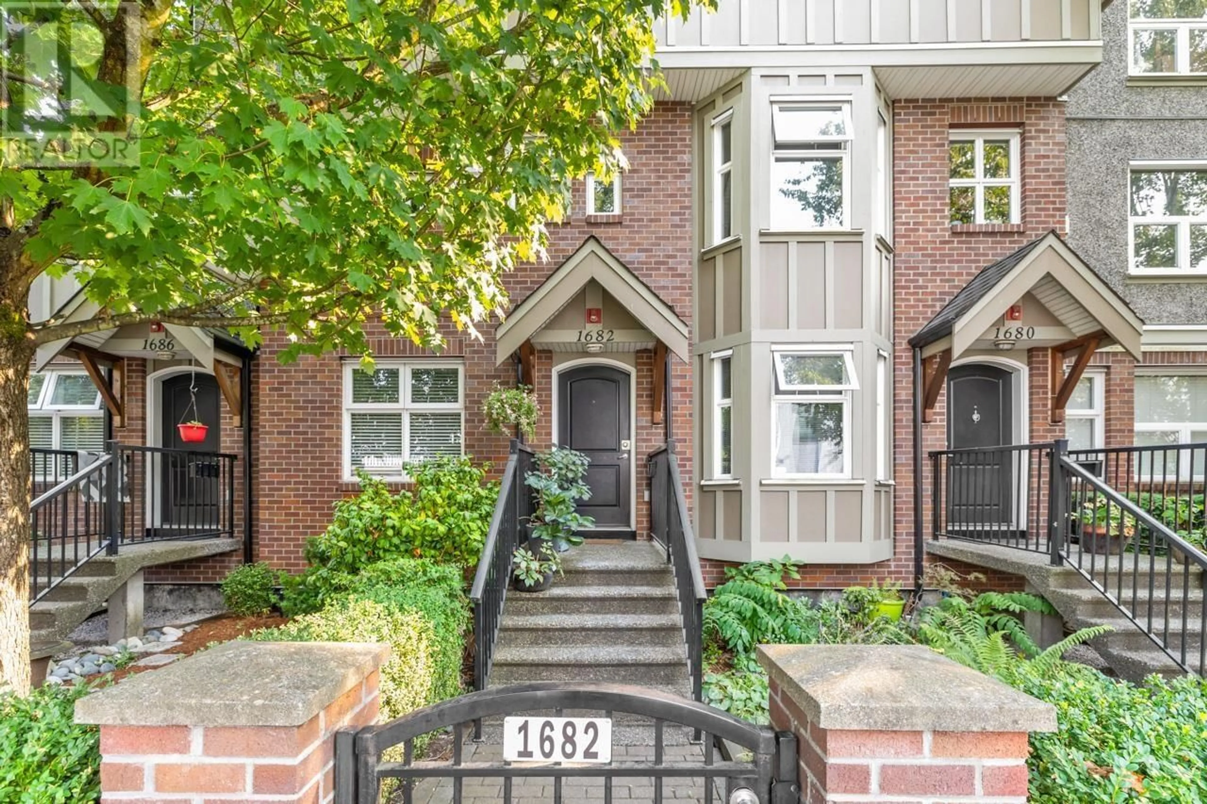 Home with brick exterior material, street for 1682 PENDER STREET, Vancouver British Columbia V5L1W3