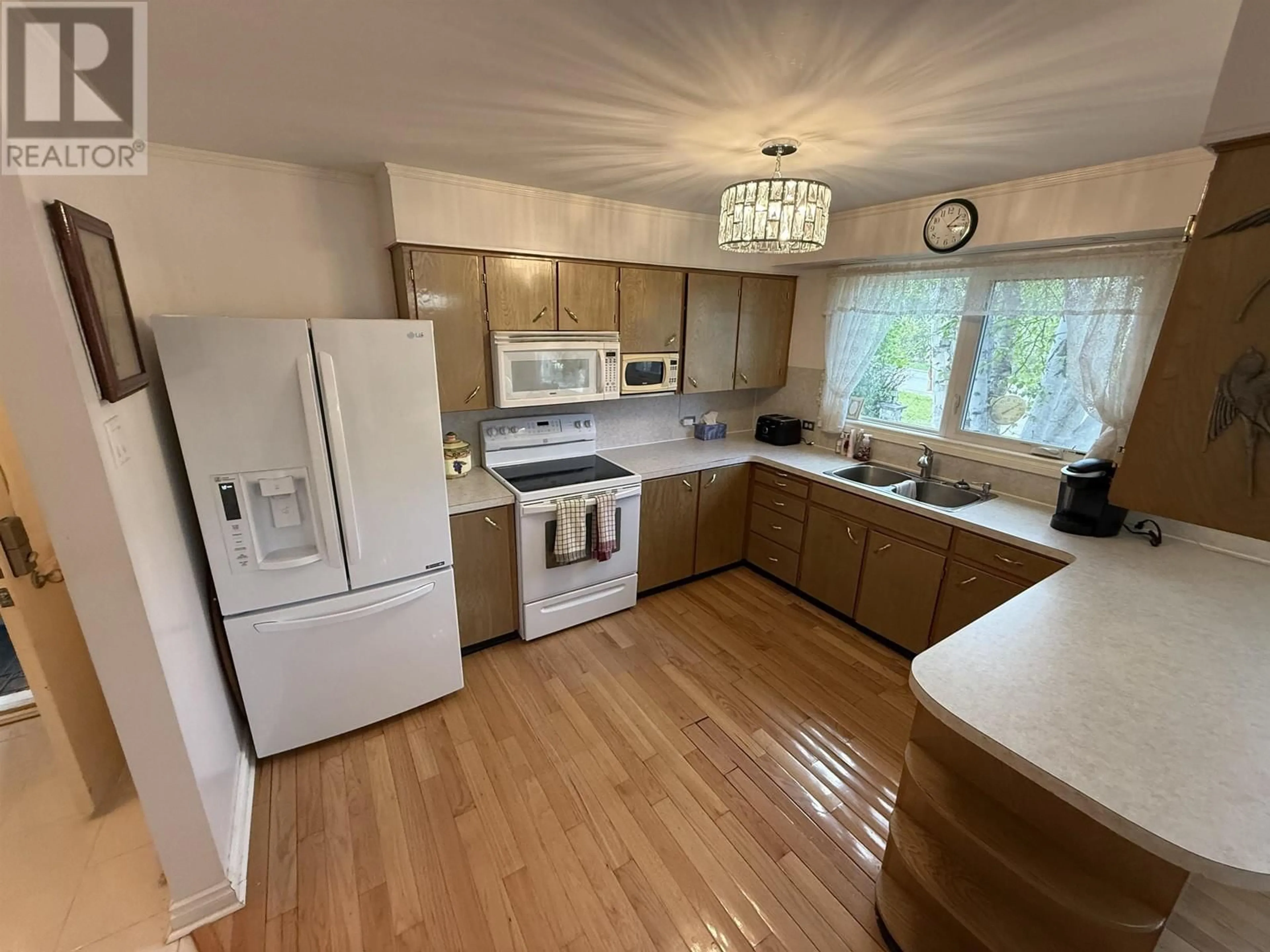 Standard kitchen, wood/laminate floor for 10108 MACDOUGALL STREET, Hudsons Hope British Columbia V0C1V0