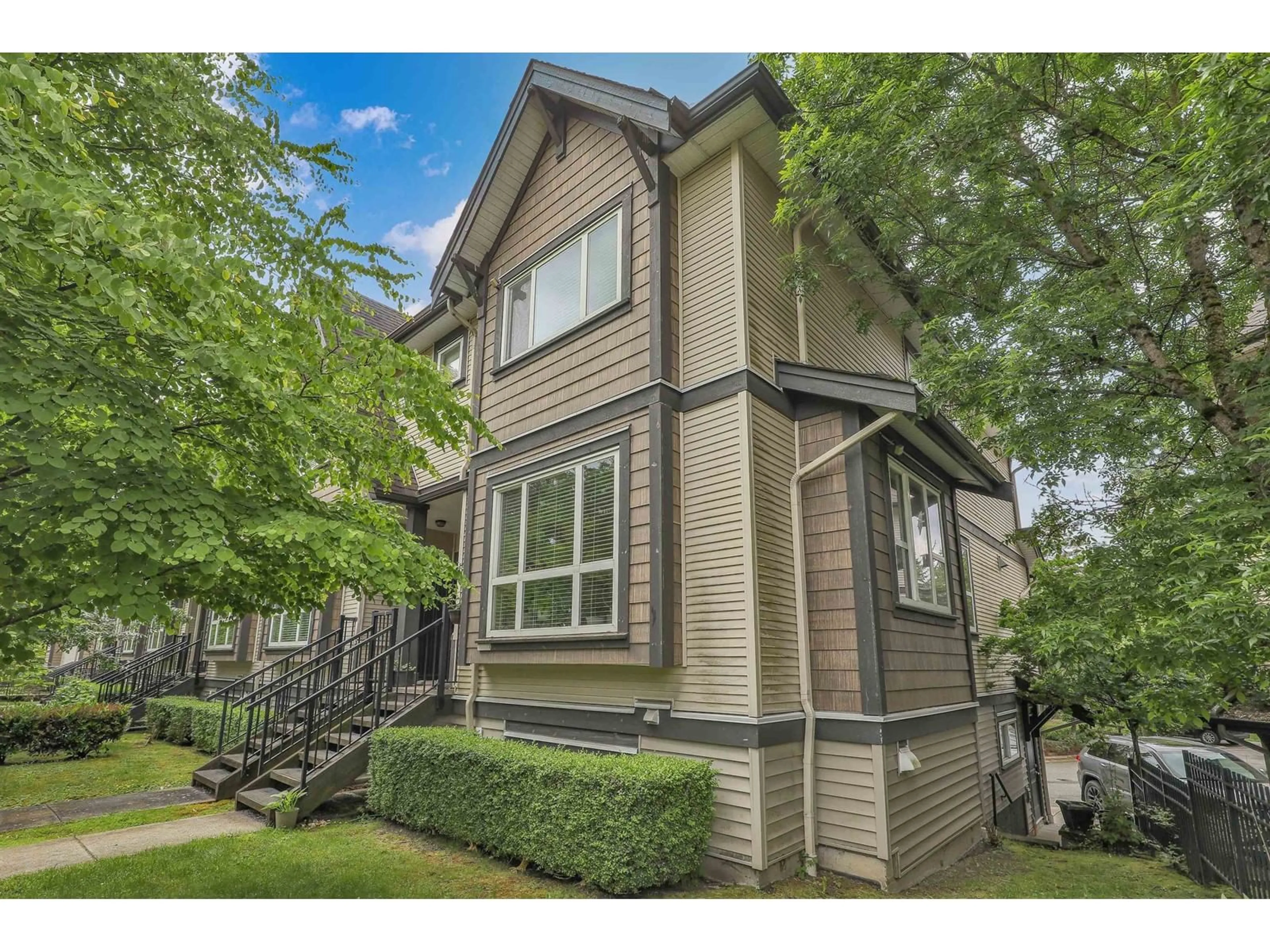 Home with vinyl exterior material, street for 11 - 9077 150TH, Surrey British Columbia V3R7Z2