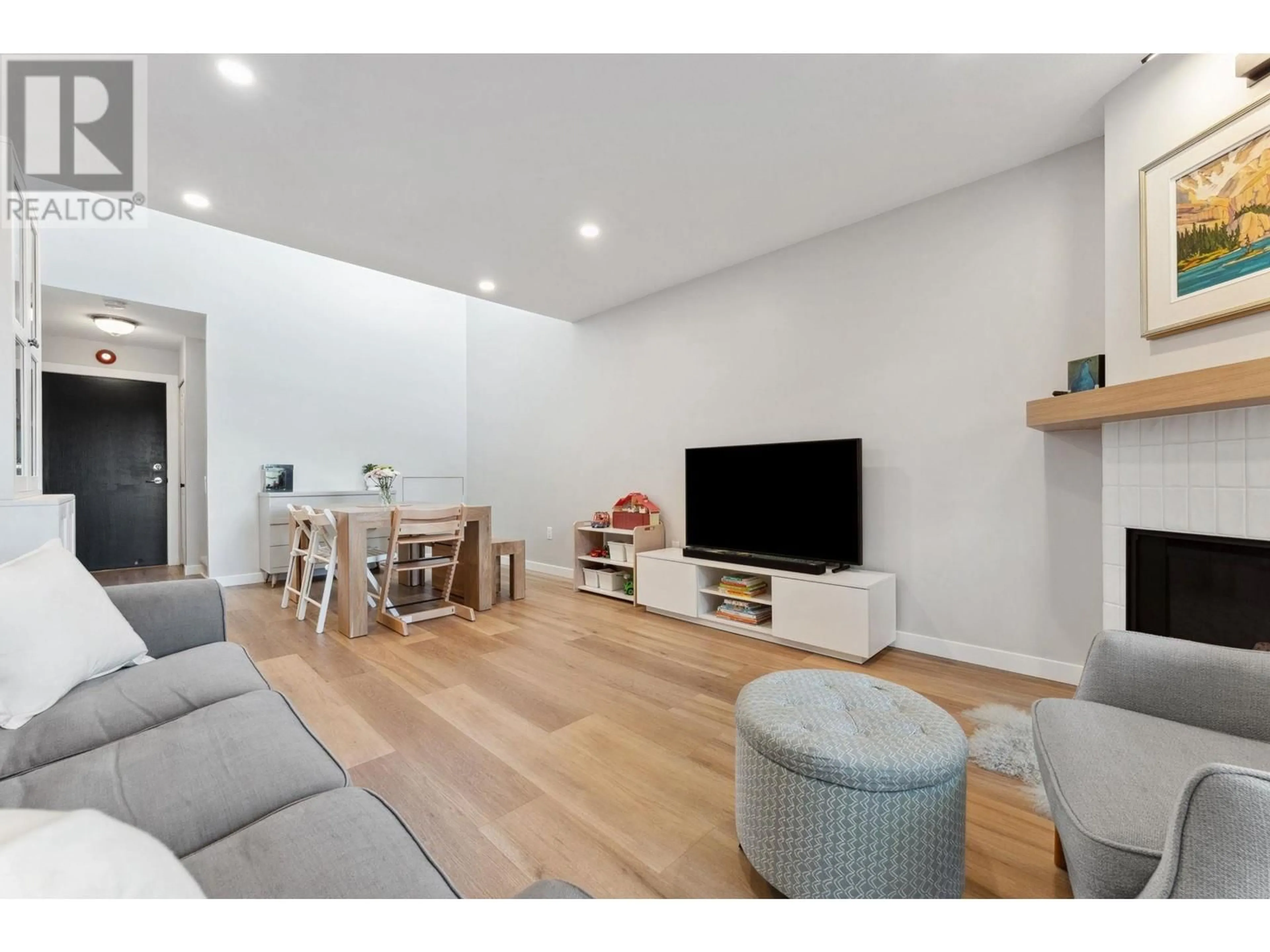 Living room with furniture, wood/laminate floor for 204 - 3861 ALBERT STREET, Burnaby British Columbia V5C2C8
