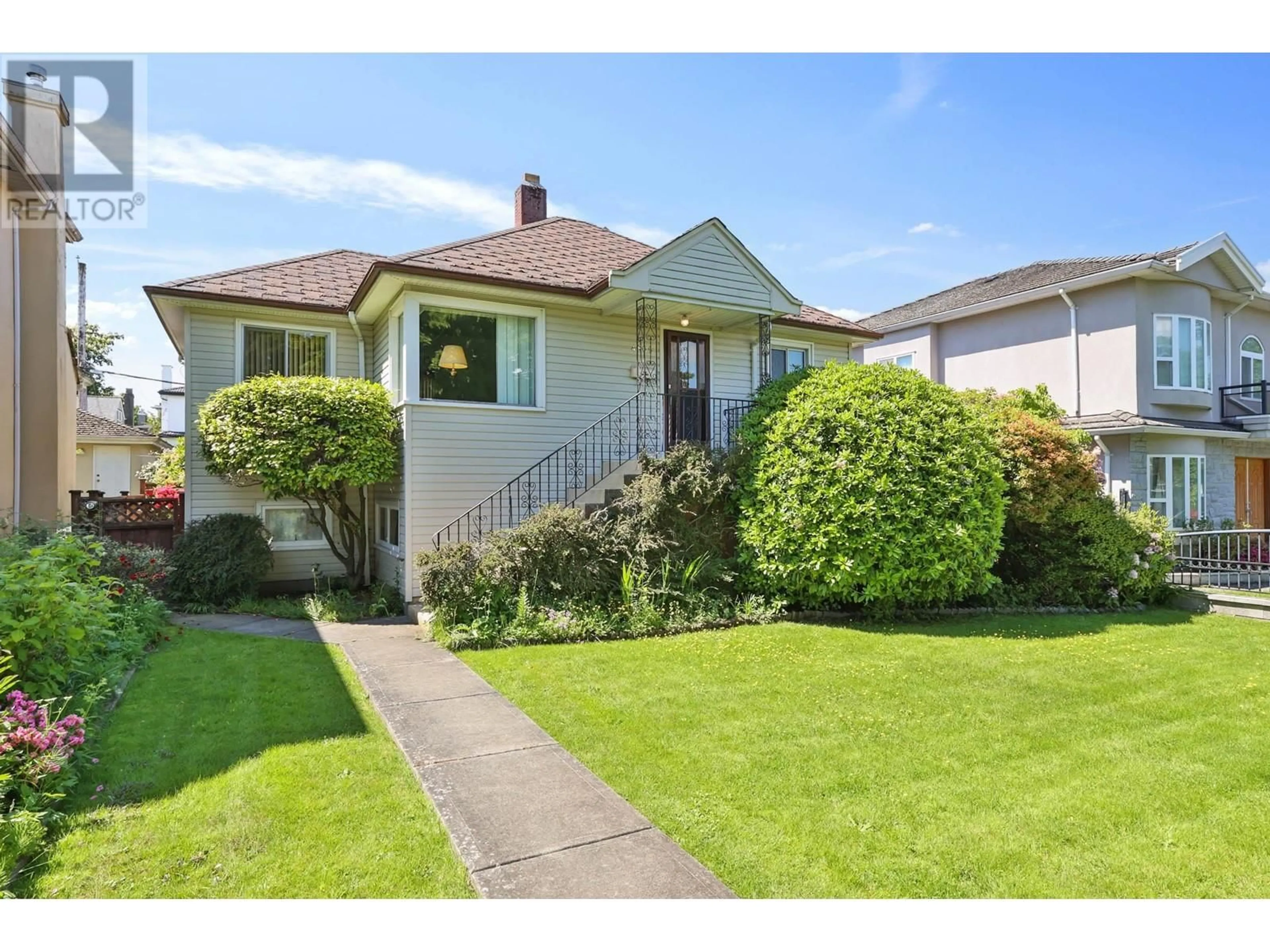 Home with vinyl exterior material, street for 4805 INVERNESS STREET, Vancouver British Columbia V5V4X5