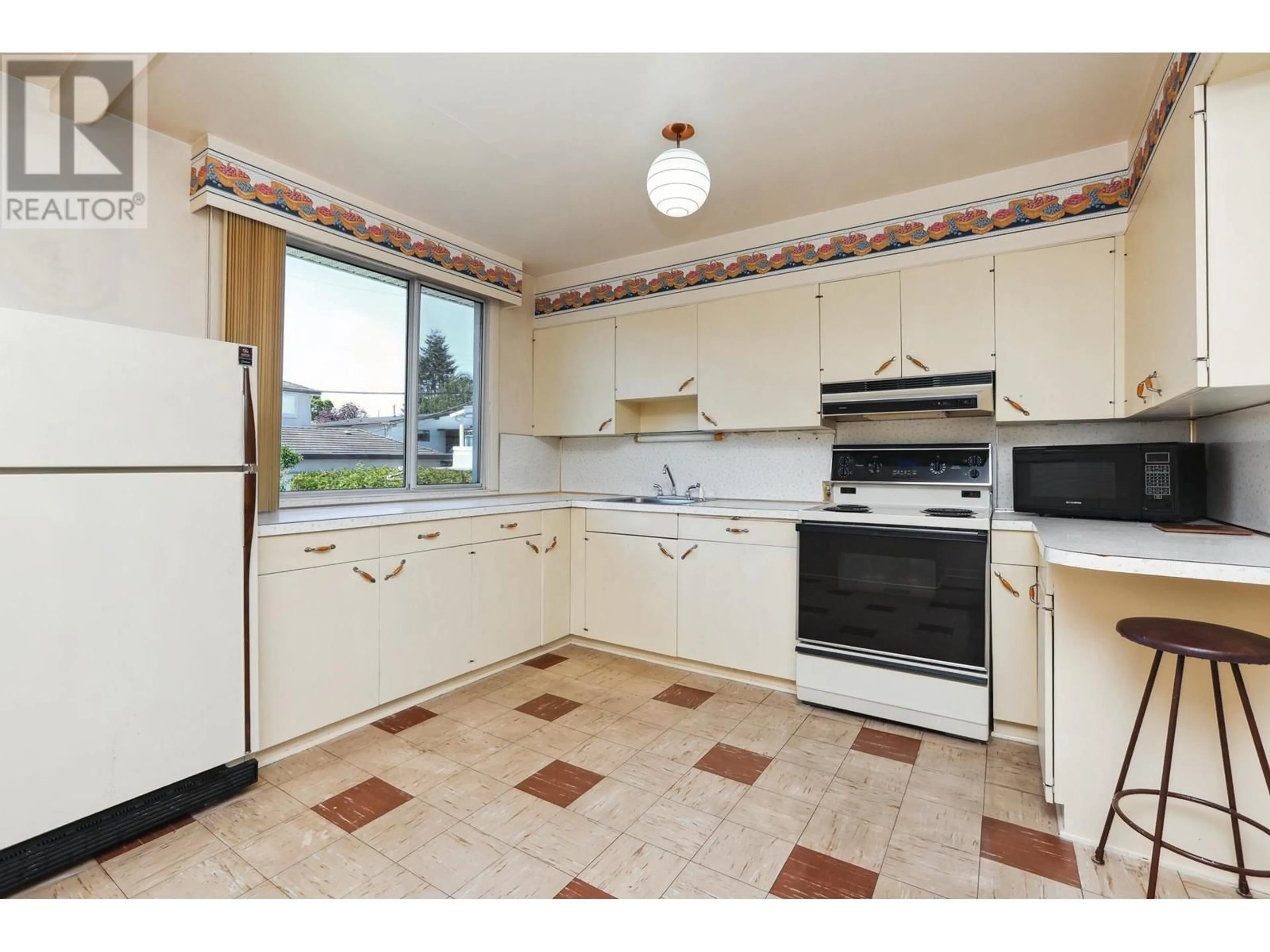 Standard kitchen, ceramic/tile floor for 4805 INVERNESS STREET, Vancouver British Columbia V5V4X5