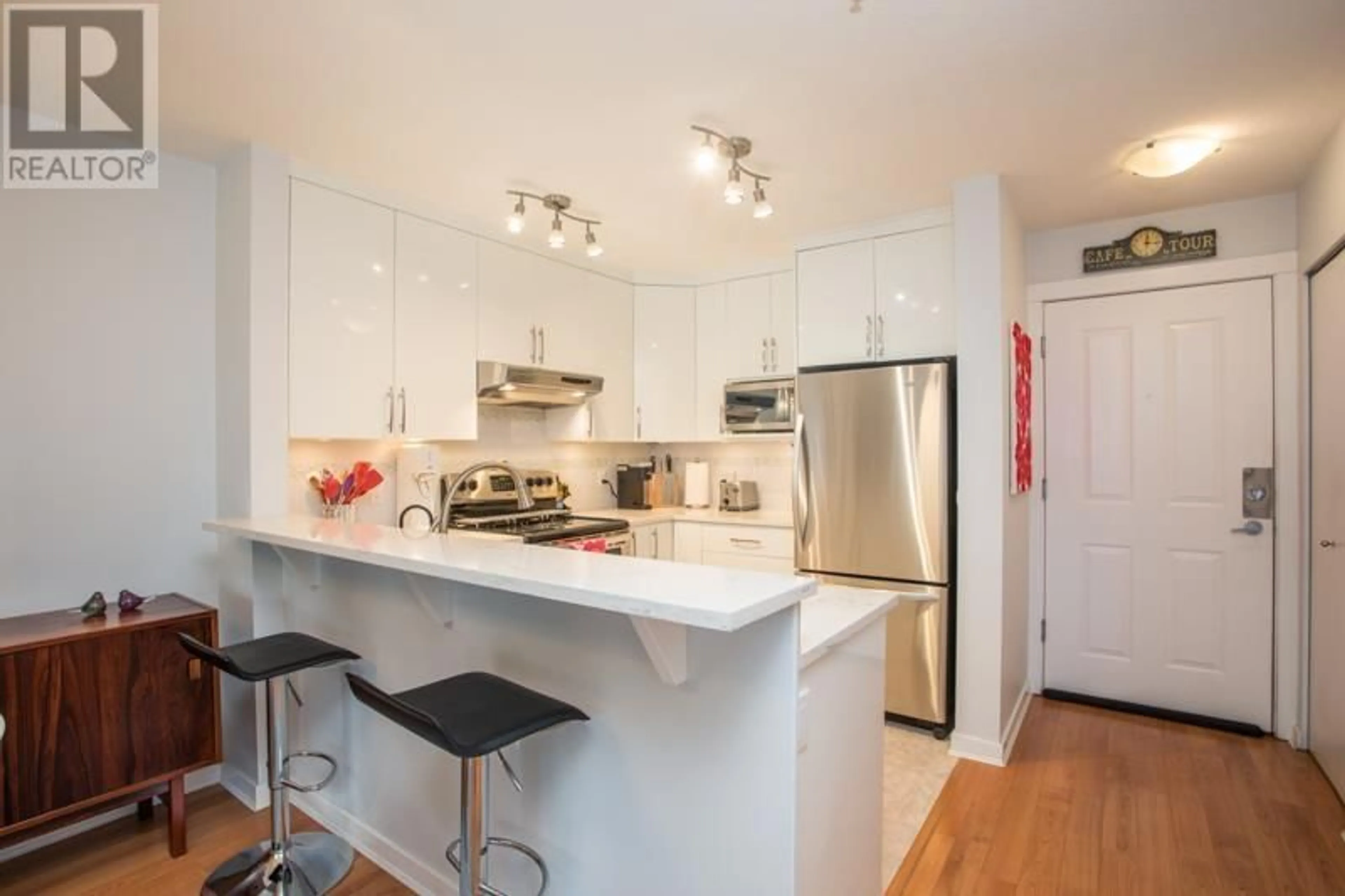 Open concept kitchen, wood/laminate floor for 207 - 3038 KENT AVENUE SOUTH, Vancouver British Columbia V5S4V8