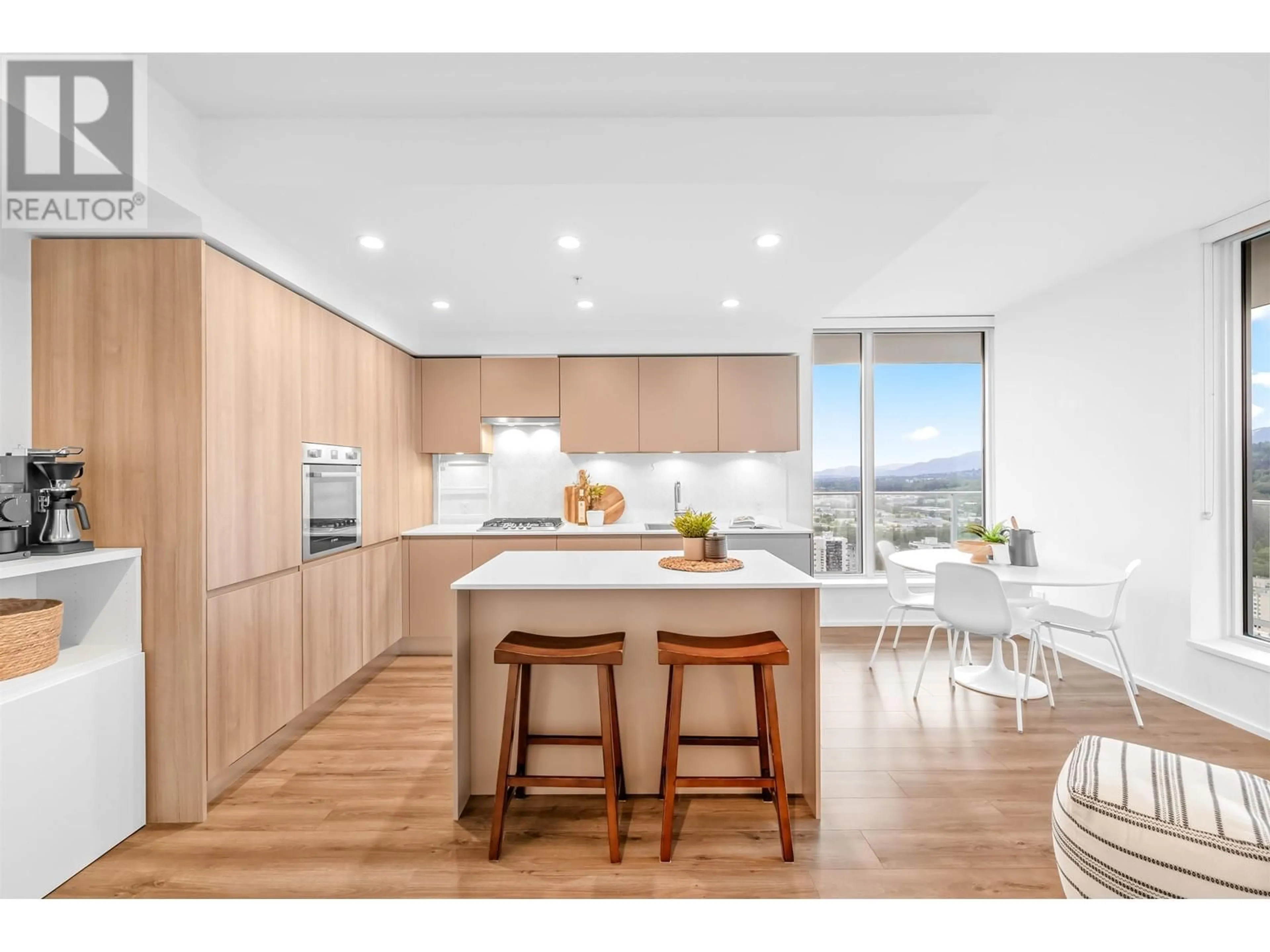 Open concept kitchen, wood/laminate floor for 4110 - 3833 EVERGREEN PLACE, Burnaby British Columbia V3J0M2