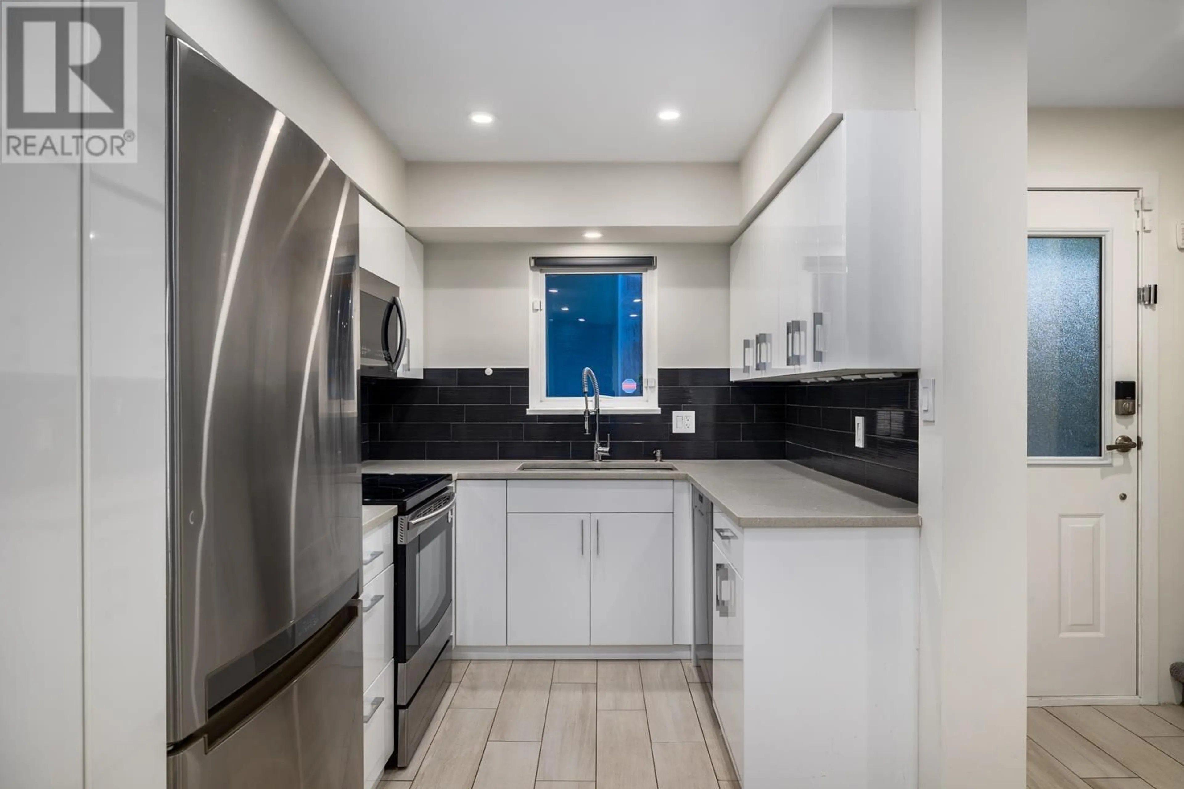 Standard kitchen, ceramic/tile floor for 2391 OAK STREET, Vancouver British Columbia V6H2J8