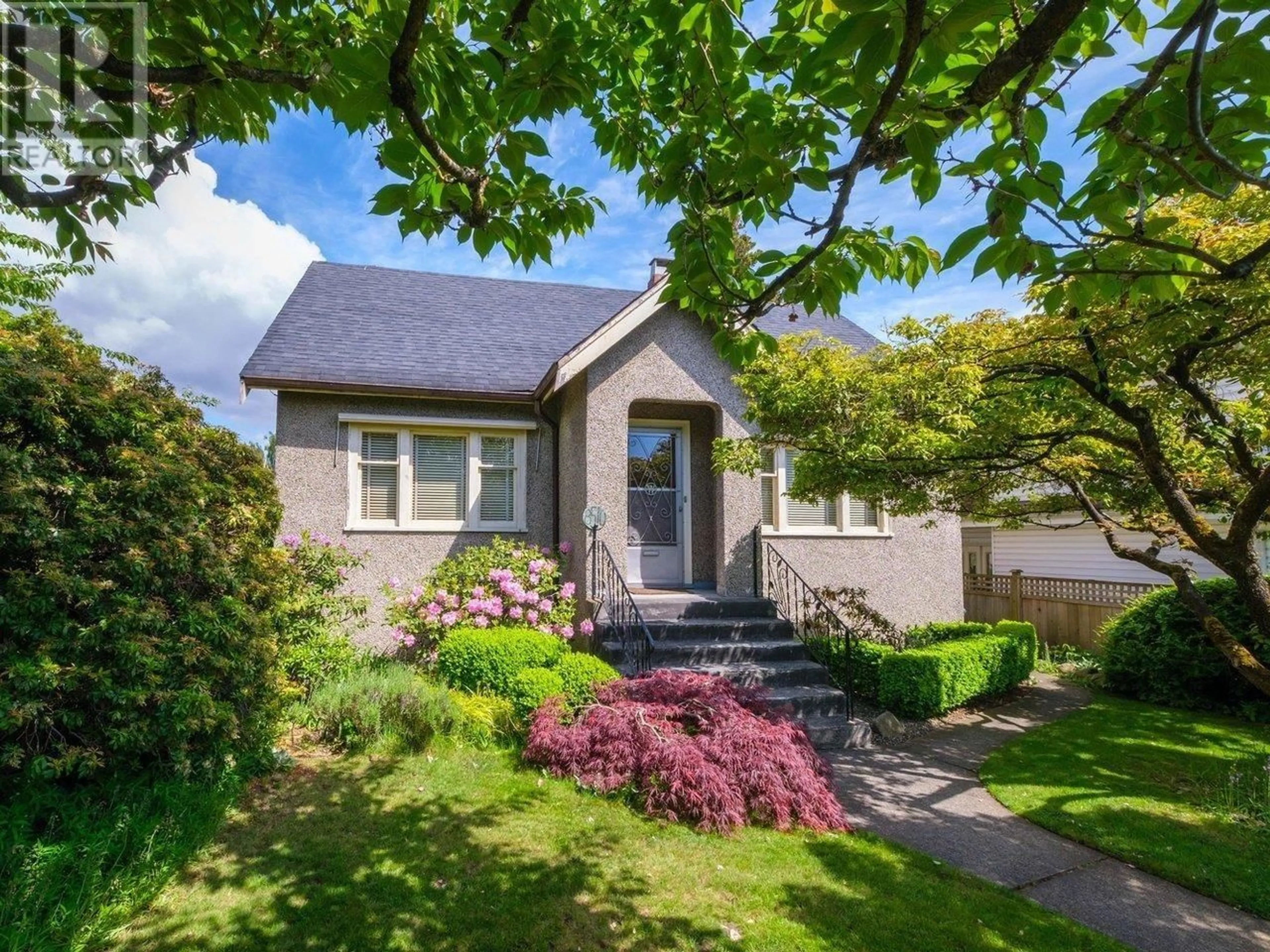 Home with vinyl exterior material, street for 8510 MONTCALM STREET, Vancouver British Columbia V6P4P7