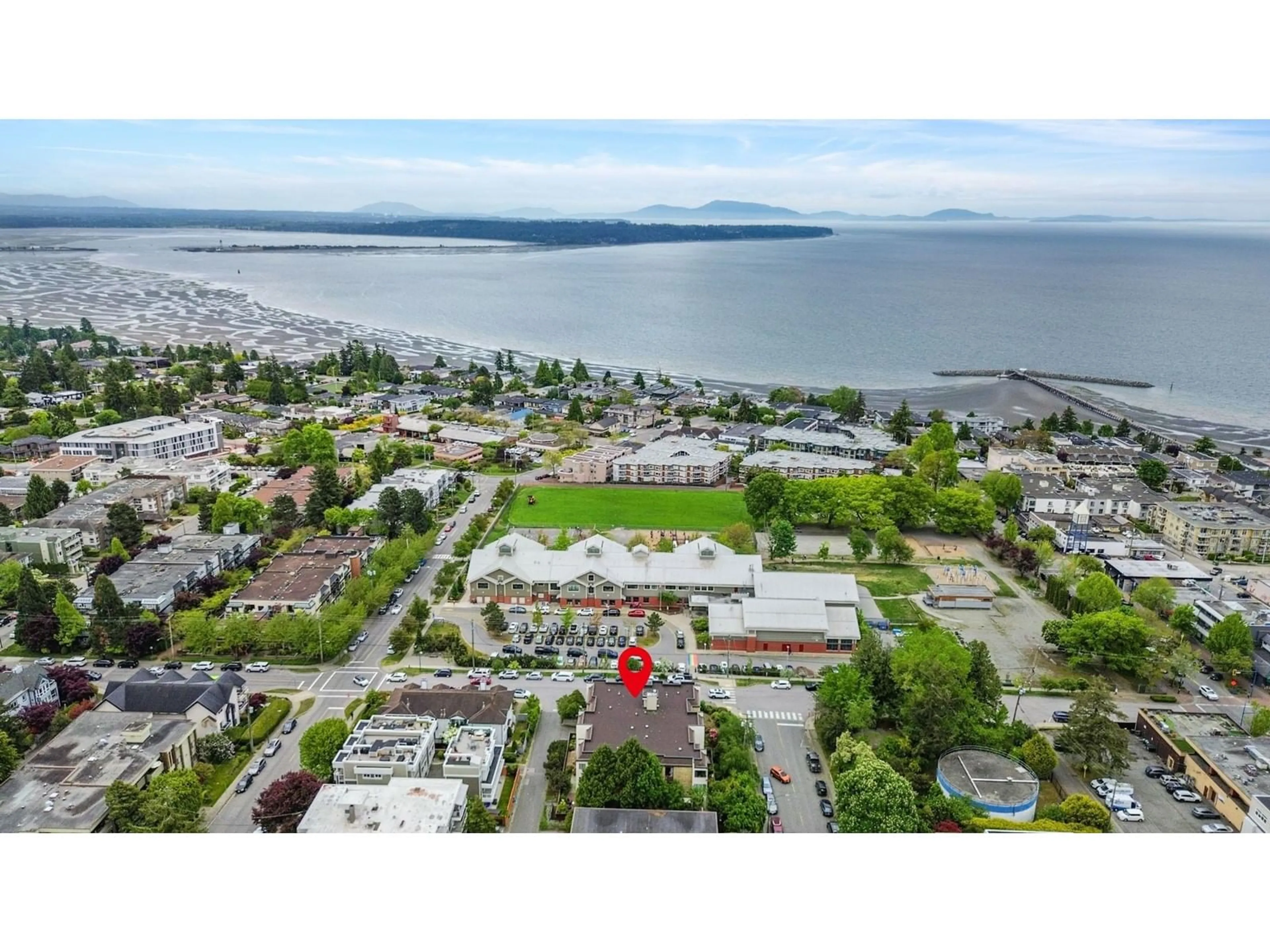A pic from outside/outdoor area/front of a property/back of a property/a pic from drone, water/lake/river/ocean view for 203 - 15265 ROPER, White Rock British Columbia V4B2E9