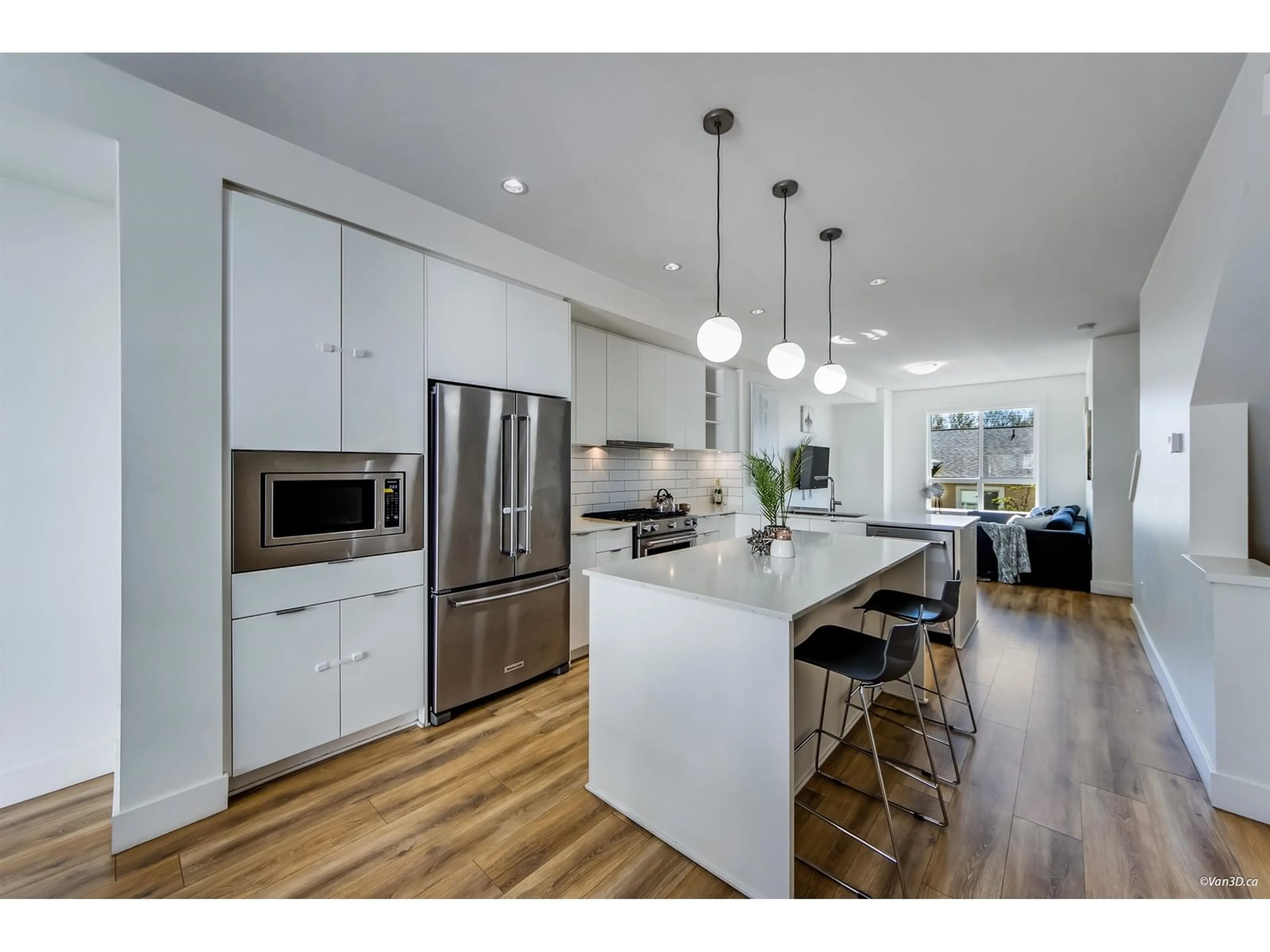 Open concept kitchen, wood/laminate floor for 71 - 16561 17A, Surrey British Columbia V3Z1J3