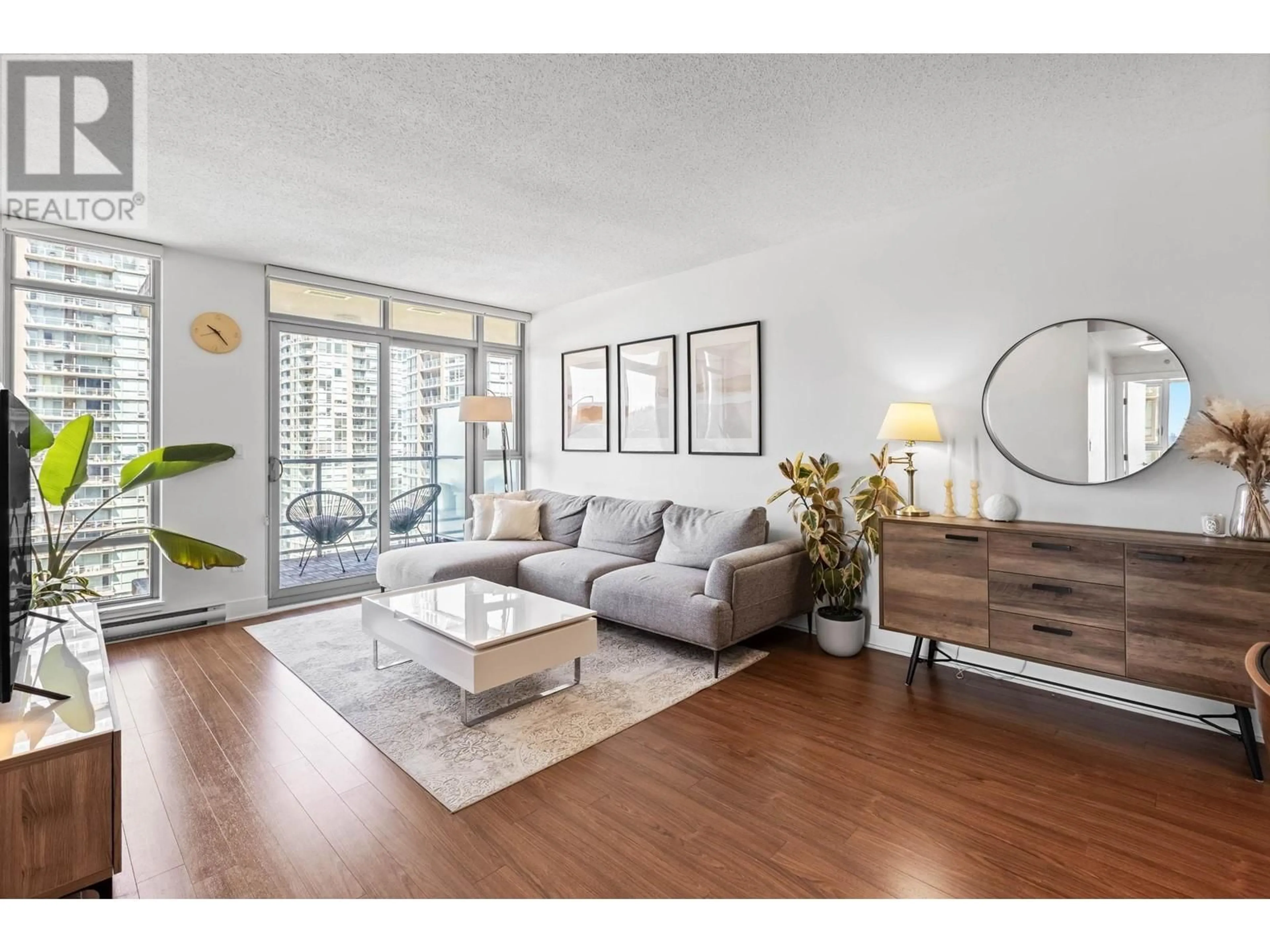 Living room with furniture, wood/laminate floor for 2102 - 1155 THE HIGH STREET, Coquitlam British Columbia V3B7W4