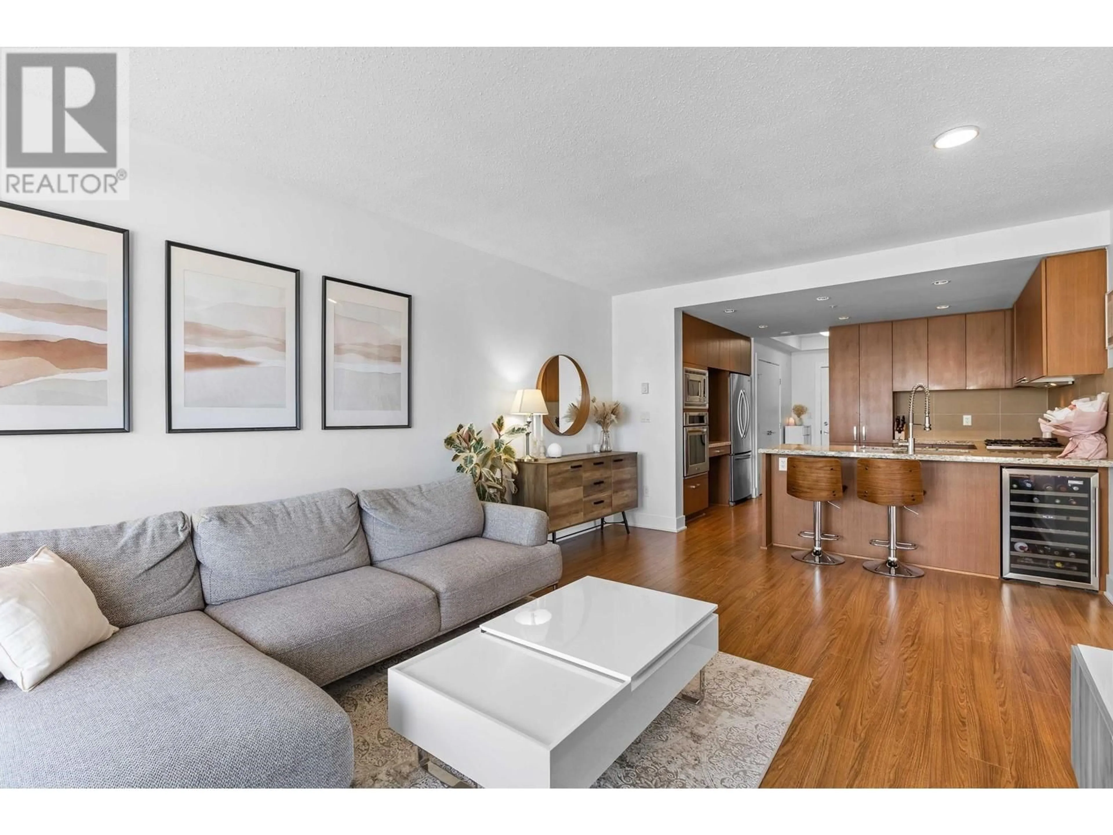 Living room with furniture, wood/laminate floor for 2102 - 1155 THE HIGH STREET, Coquitlam British Columbia V3B7W4