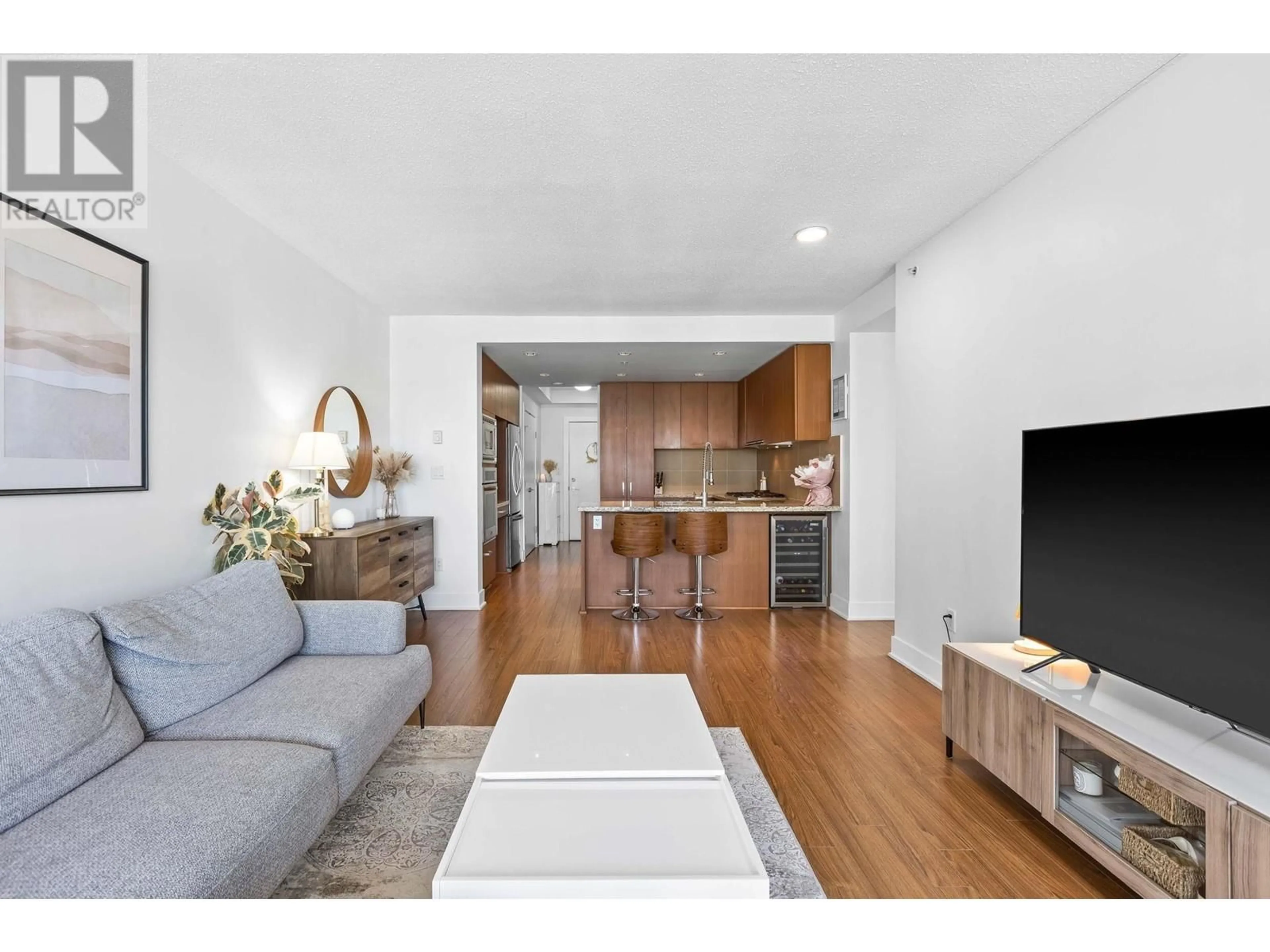 Living room with furniture, wood/laminate floor for 2102 - 1155 THE HIGH STREET, Coquitlam British Columbia V3B7W4