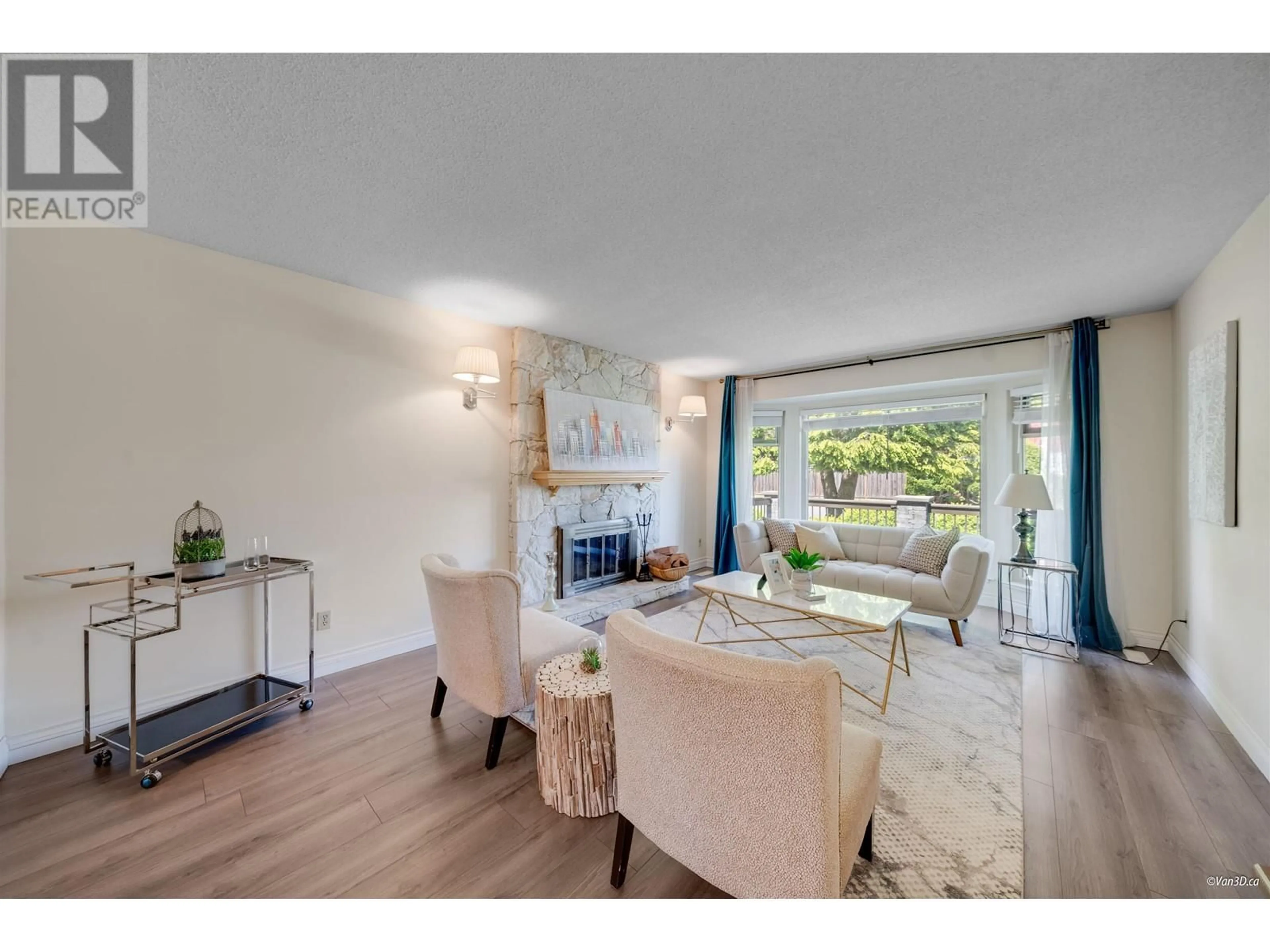 Living room with furniture, wood/laminate floor for 9666 ASHWOOD DRIVE, Richmond British Columbia V6Y2Z5