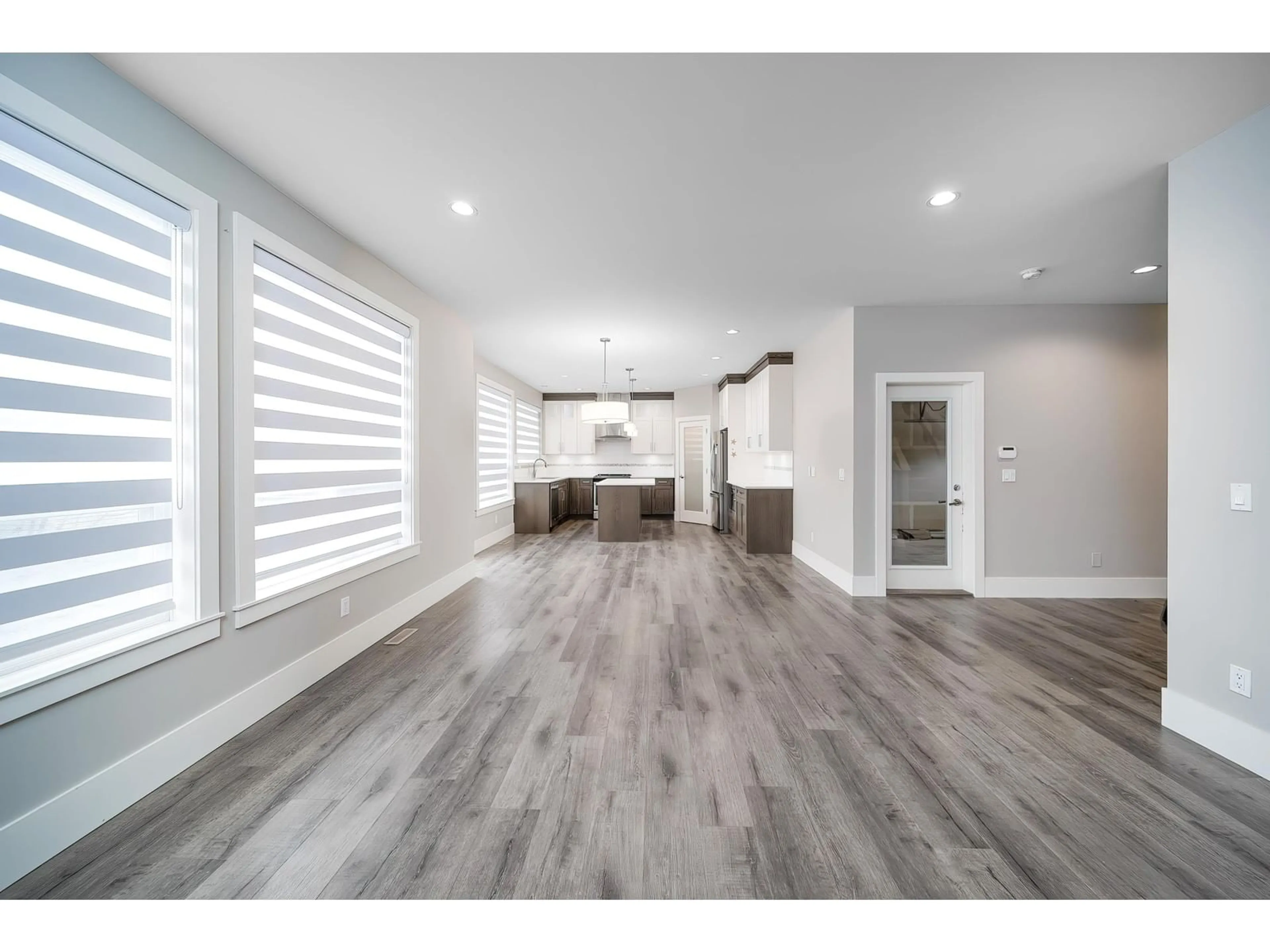 Open concept kitchen, wood/laminate floor for 14721 61, Surrey British Columbia V3S3W5