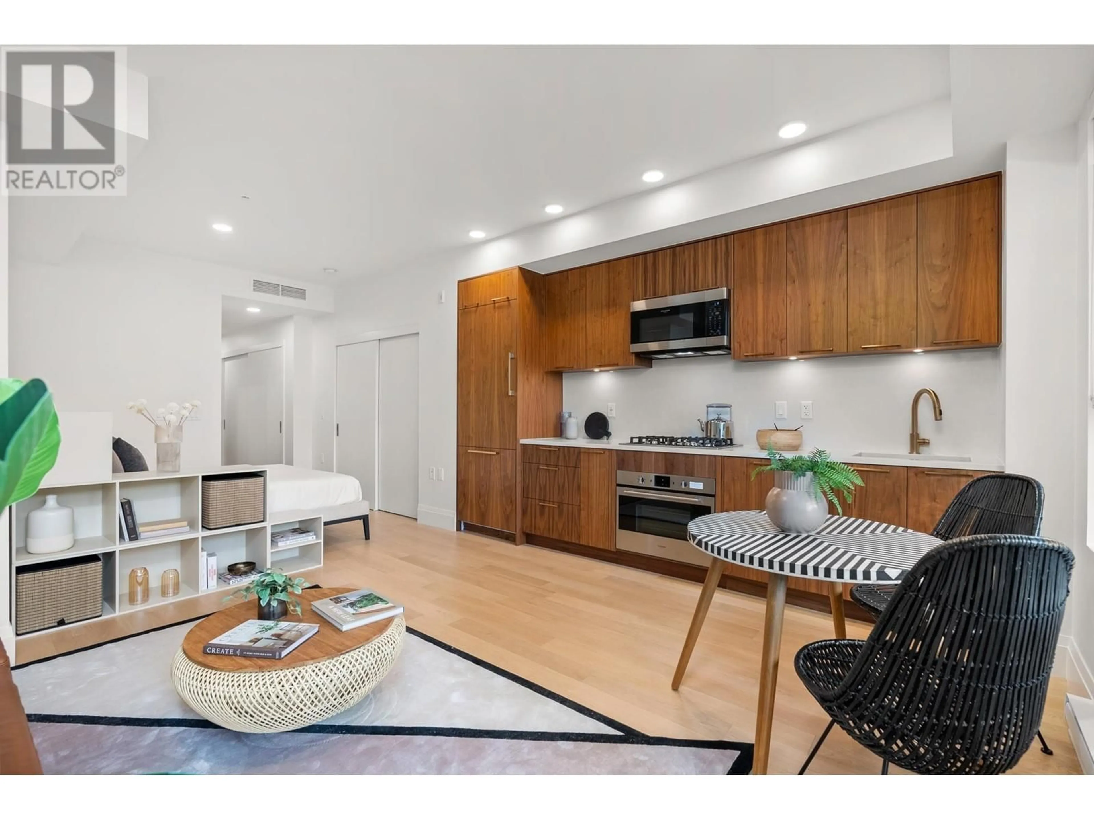 Open concept kitchen, unknown for 106 - 2550 GARDEN DRIVE, Vancouver British Columbia V5N4X6