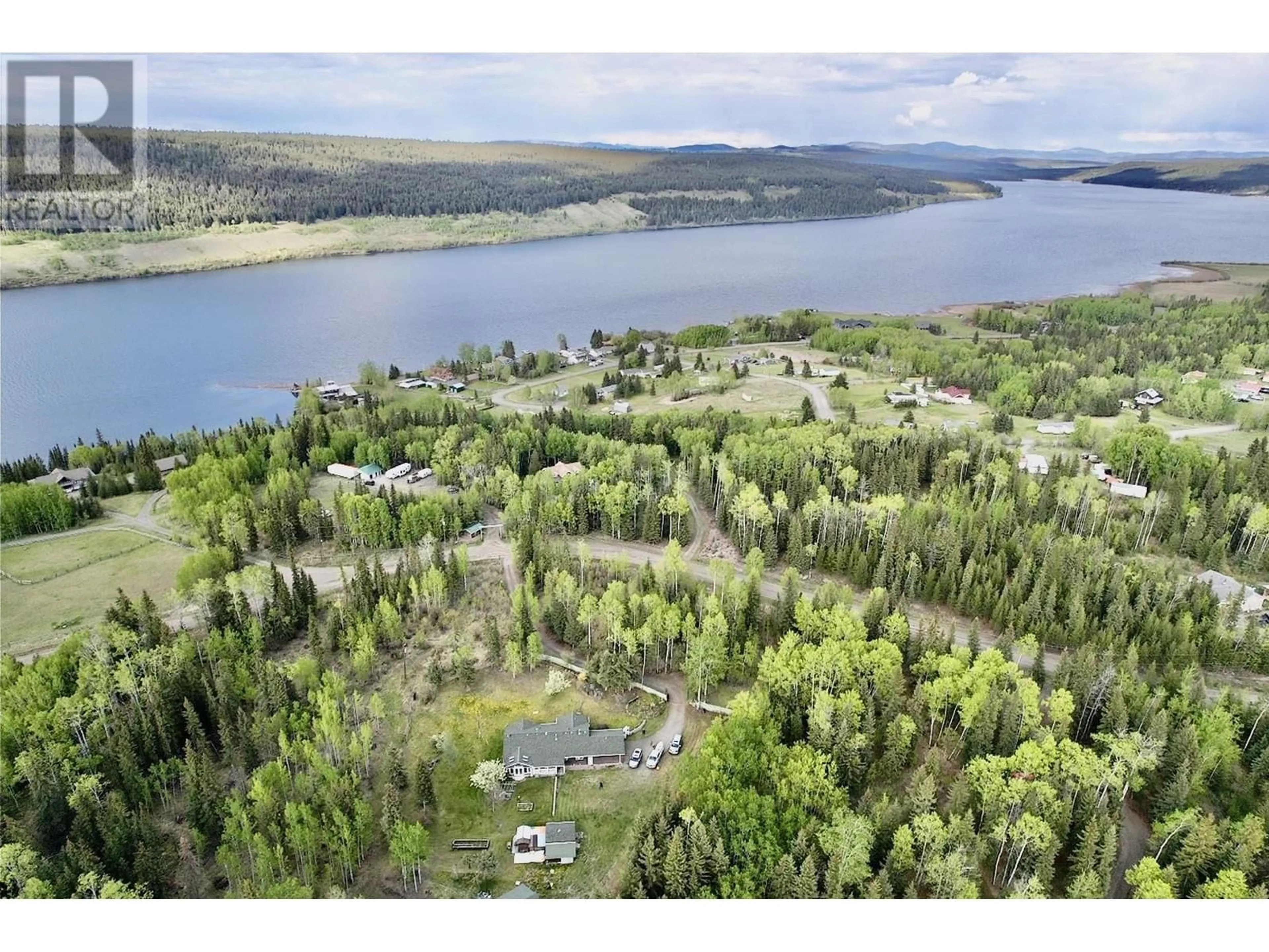 A pic from outside/outdoor area/front of a property/back of a property/a pic from drone, water/lake/river/ocean view for 6460 UNICORN ROAD, Horse Lake British Columbia V0K2E3