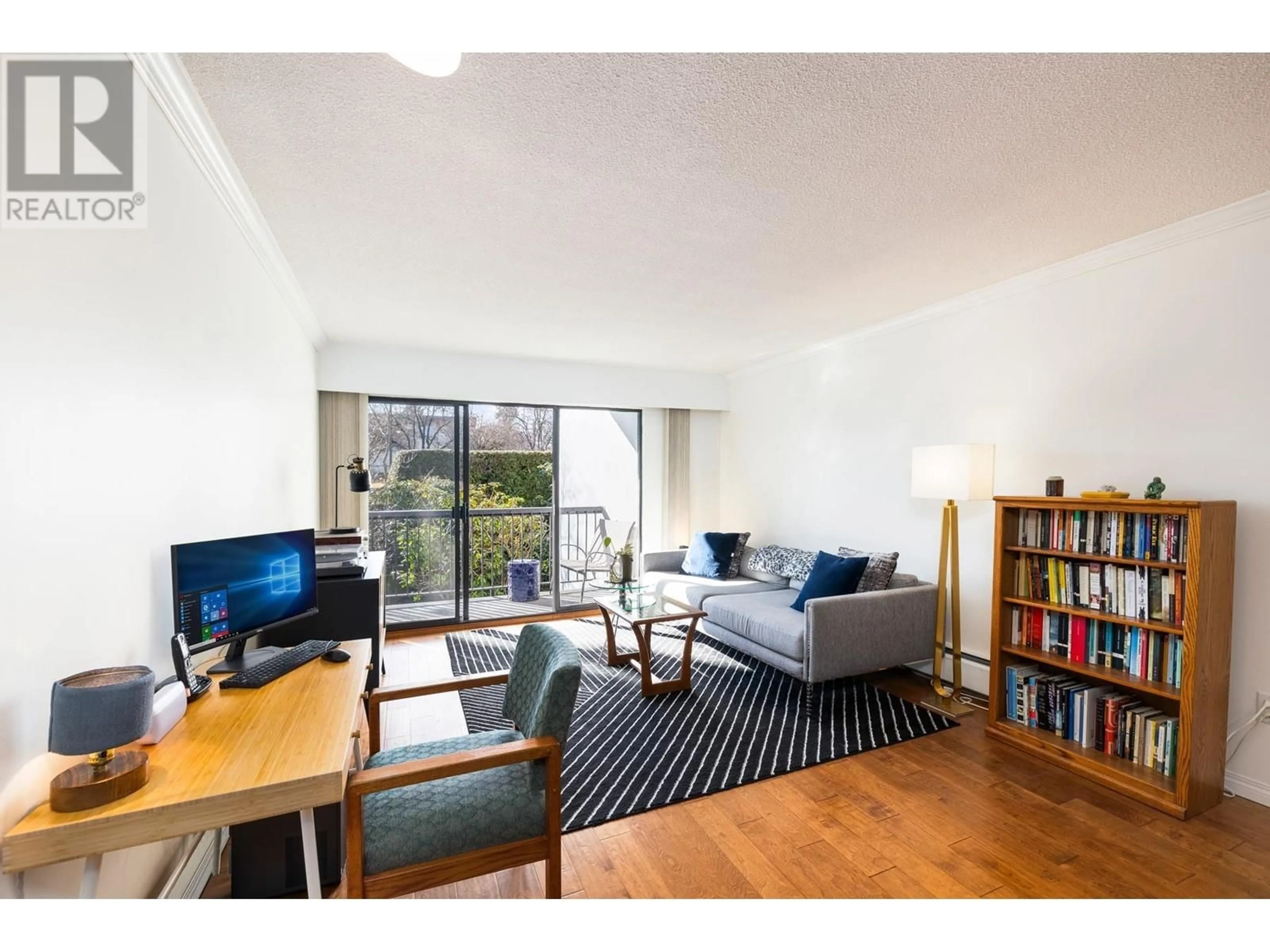 Living room with furniture, wood/laminate floor for 207 - 444 6TH AVENUE, Vancouver British Columbia V5T1K6