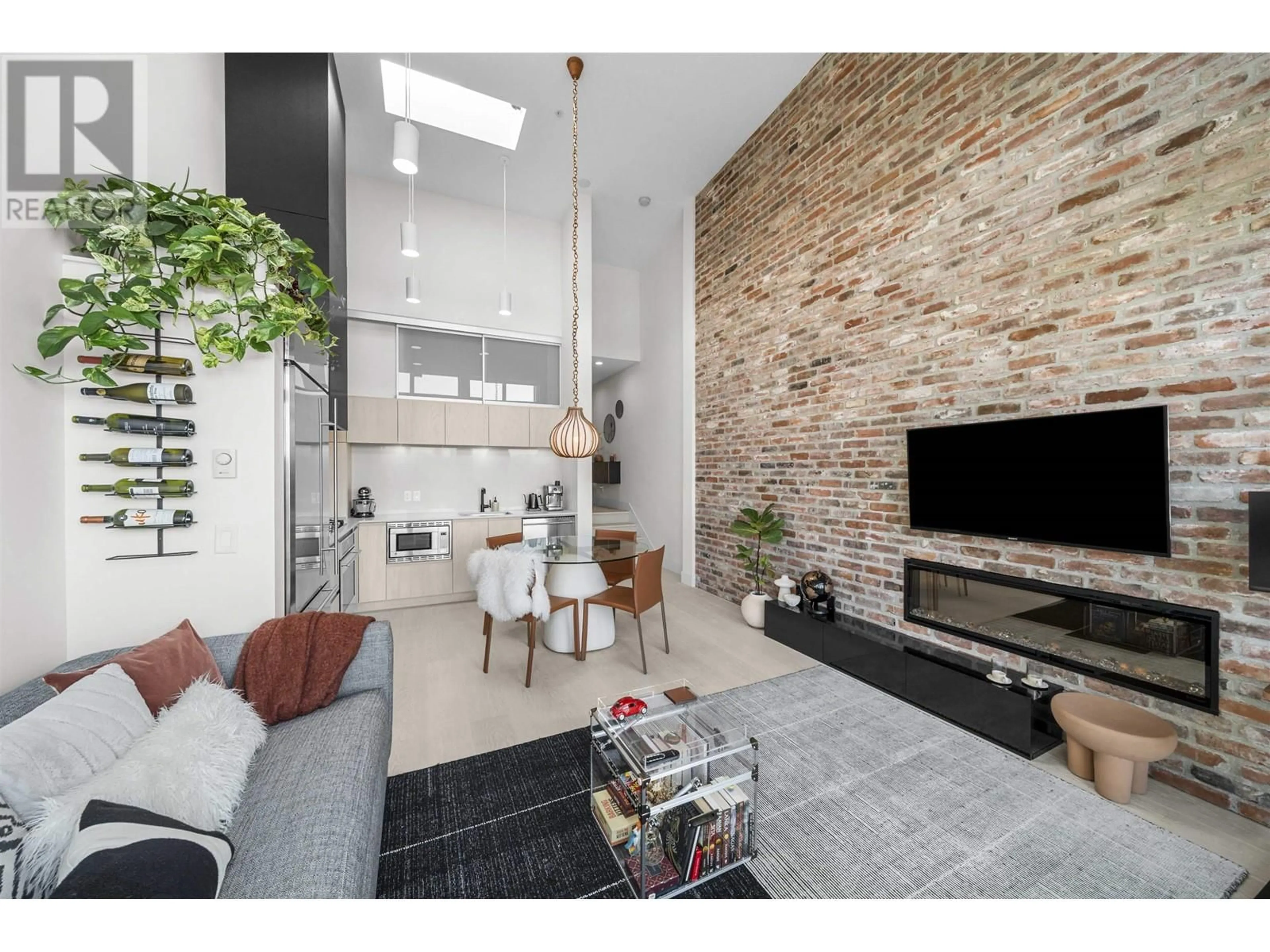 Living room with furniture, ceramic/tile floor for 422 - 300 SALTER STREET, New Westminster British Columbia V3M0L9