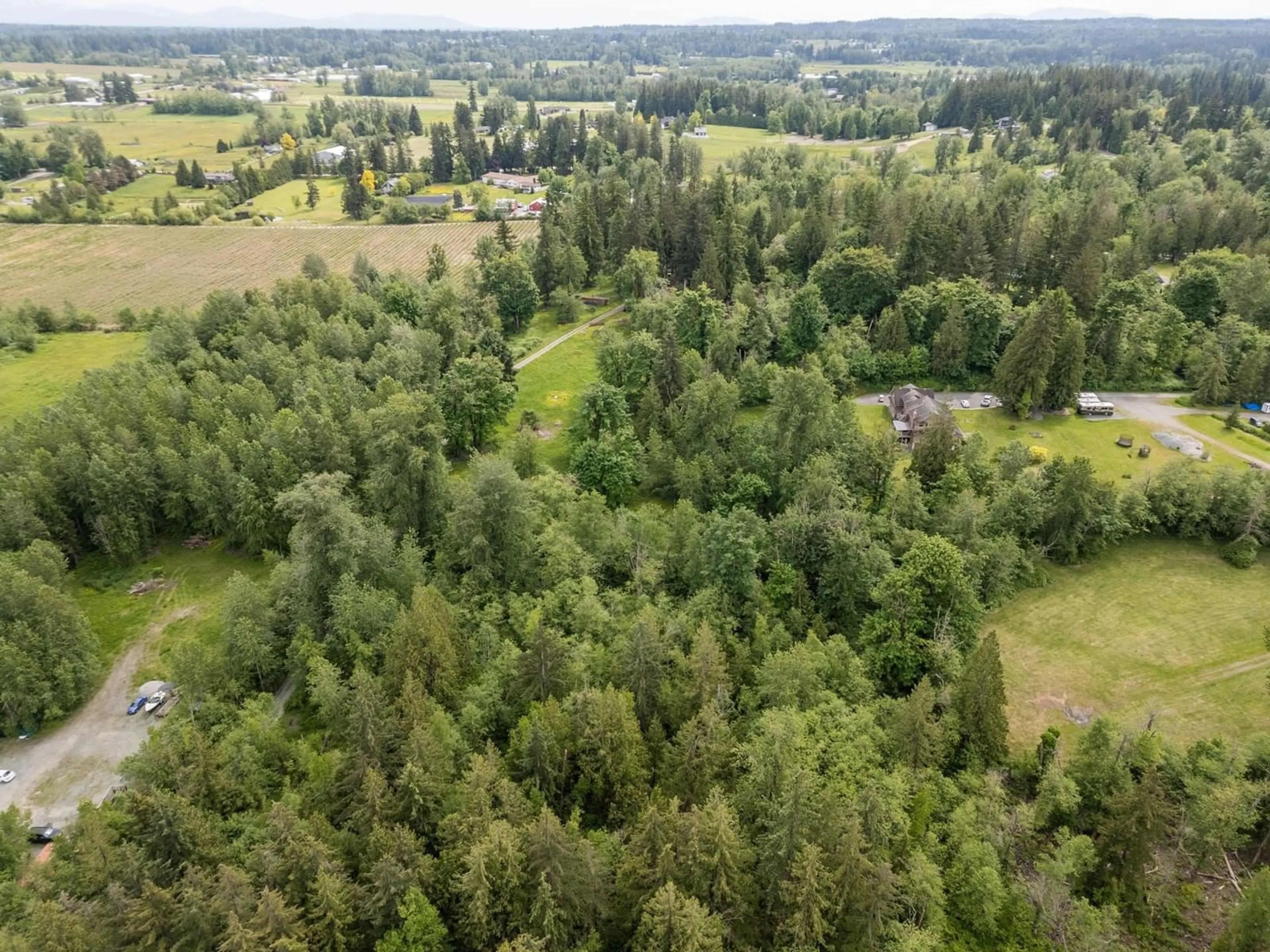 A pic from outside/outdoor area/front of a property/back of a property/a pic from drone, forest/trees view for 3390 210, Langley British Columbia V2Z2E5