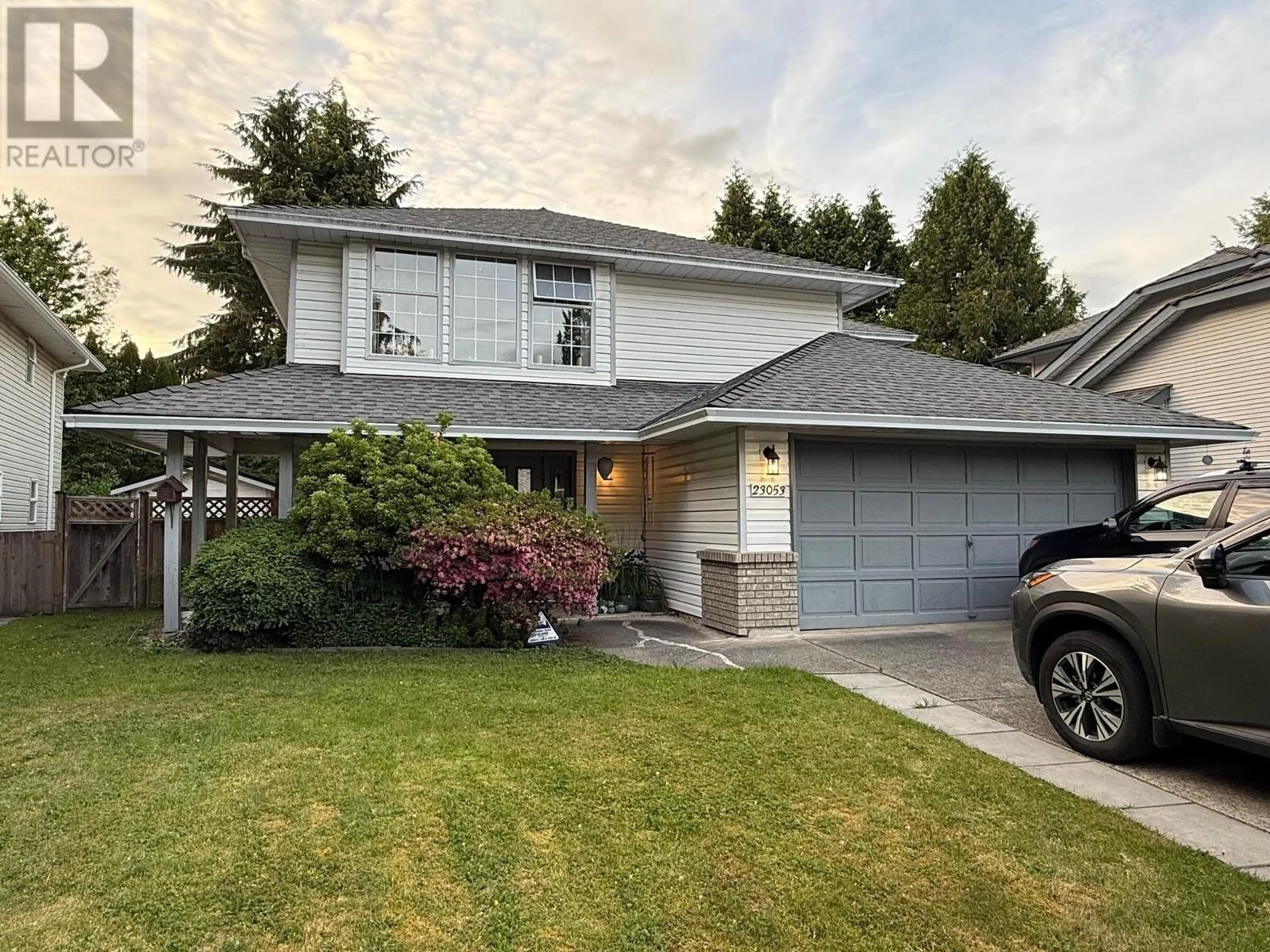 Home with vinyl exterior material, street for 23053 125A AVENUE, Maple Ridge British Columbia V2X0S2