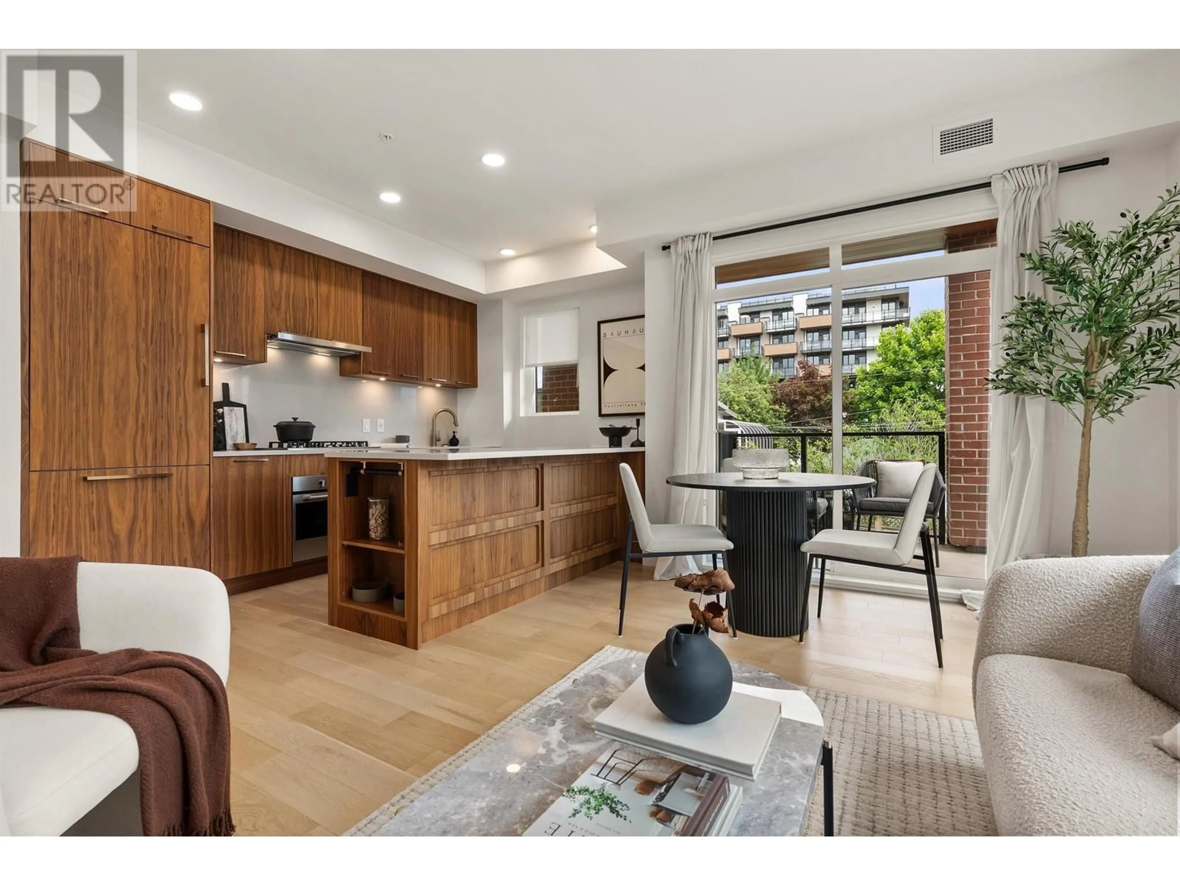Open concept kitchen, unknown for 213 - 2550 GARDEN DRIVE, Vancouver British Columbia V5N4X6