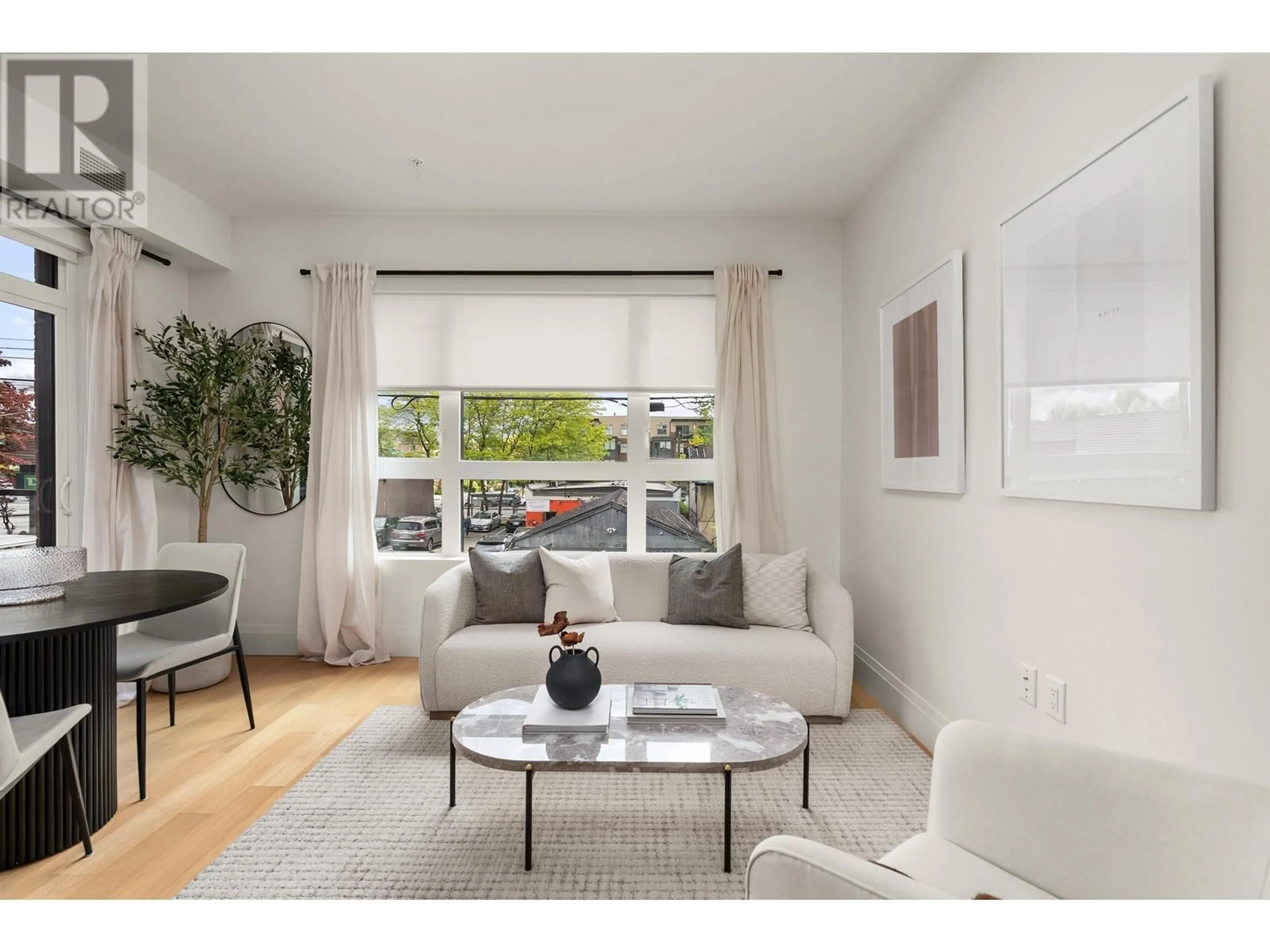 Living room with furniture, unknown for 213 - 2550 GARDEN DRIVE, Vancouver British Columbia V5N4X6