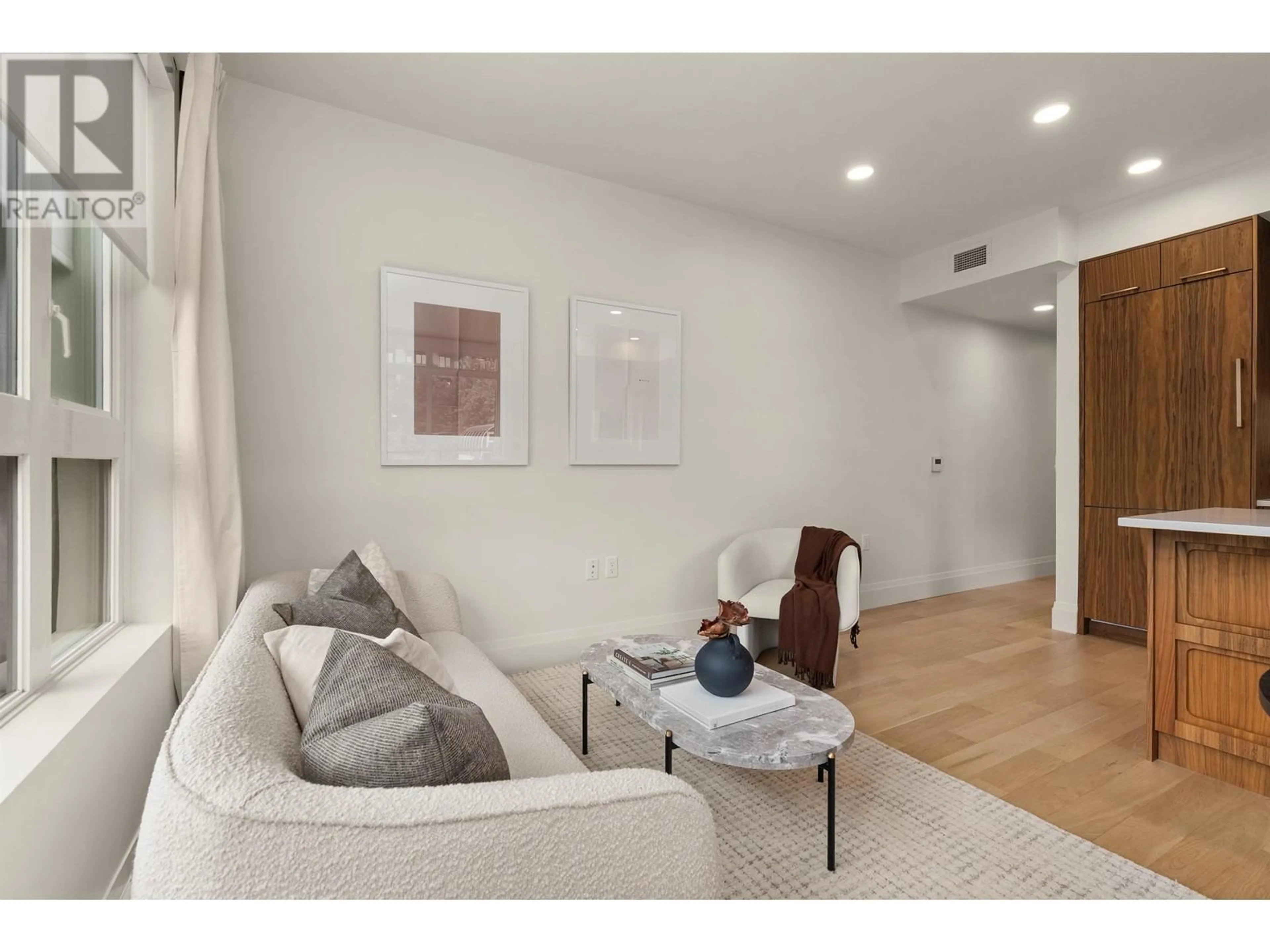 Living room with furniture, unknown for 213 - 2550 GARDEN DRIVE, Vancouver British Columbia V5N4X6
