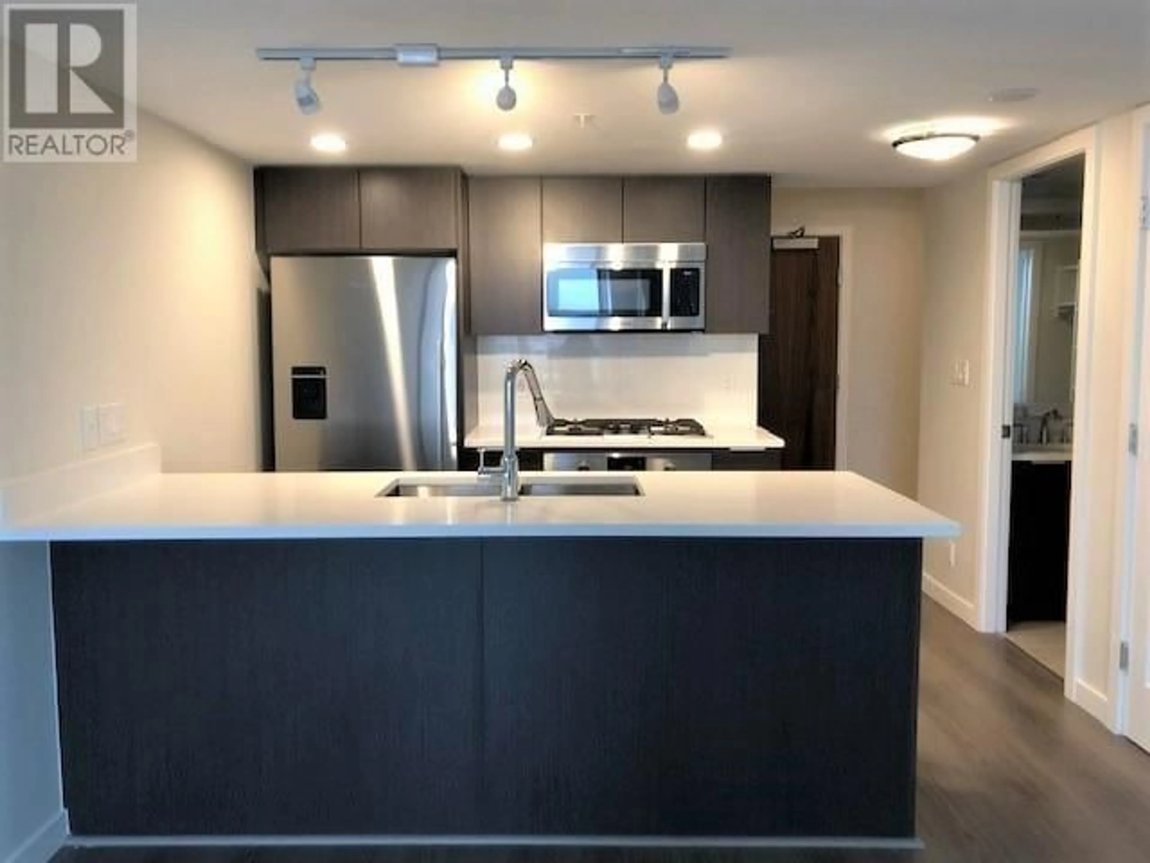Open concept kitchen, unknown for 808 - 3328 CARSCALLEN ROAD, Richmond British Columbia V6X0T6