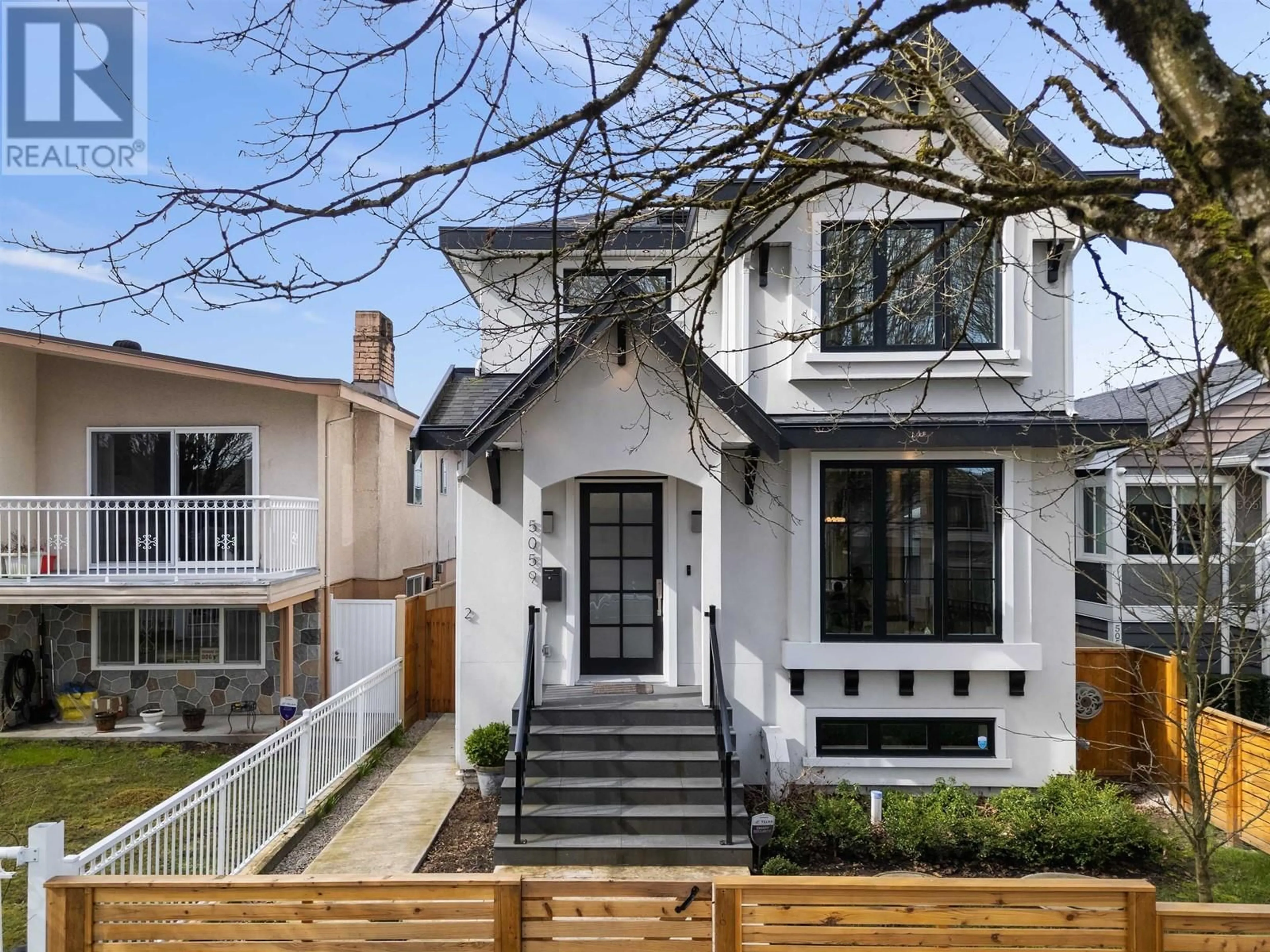 Home with brick exterior material, street for 5059 SHERBROOKE STREET, Vancouver British Columbia V5W3M1