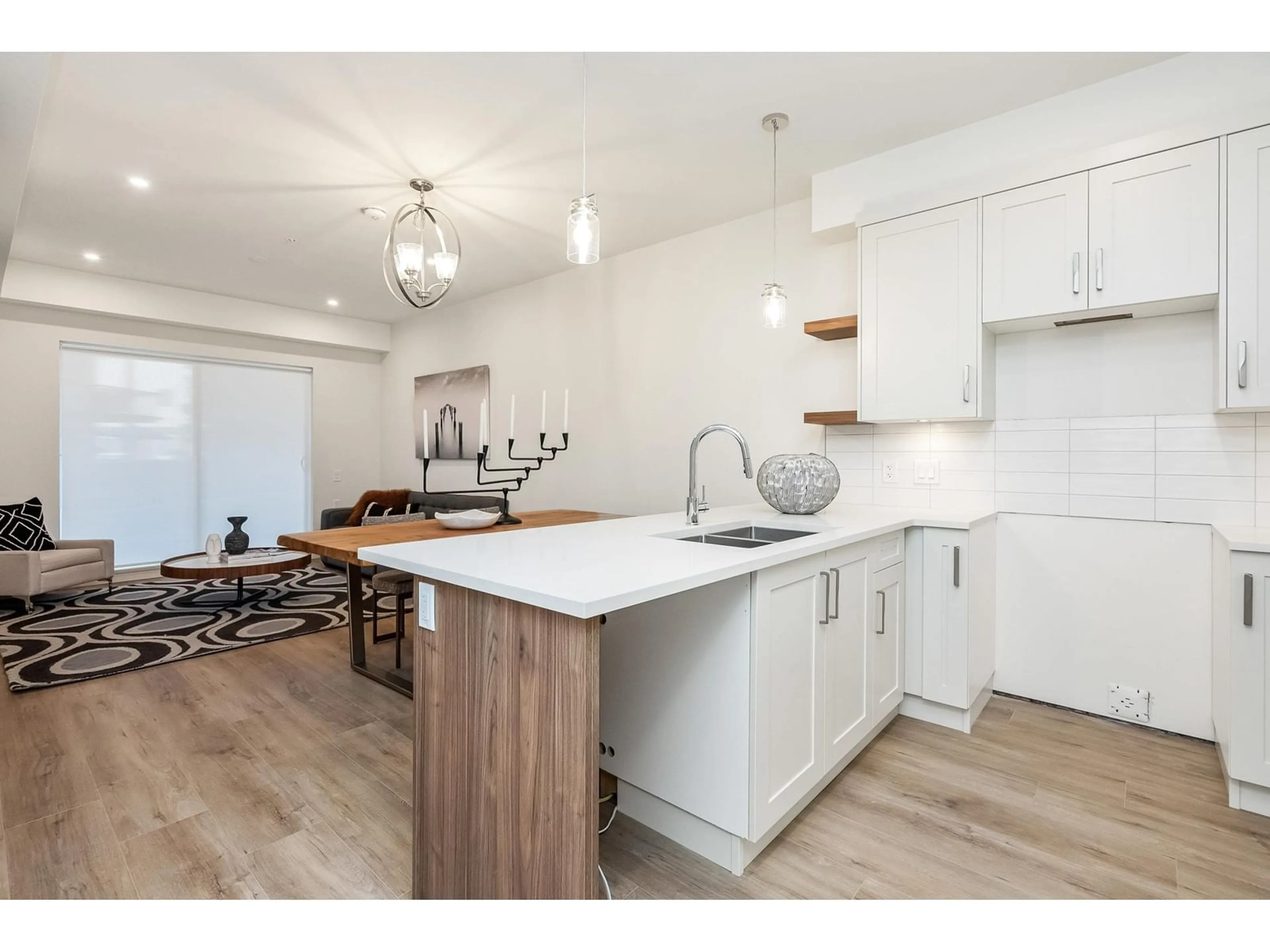Open concept kitchen, wood/laminate floor for 121 - 8497 YOUNG ROAD, Chilliwack British Columbia V2P4P2